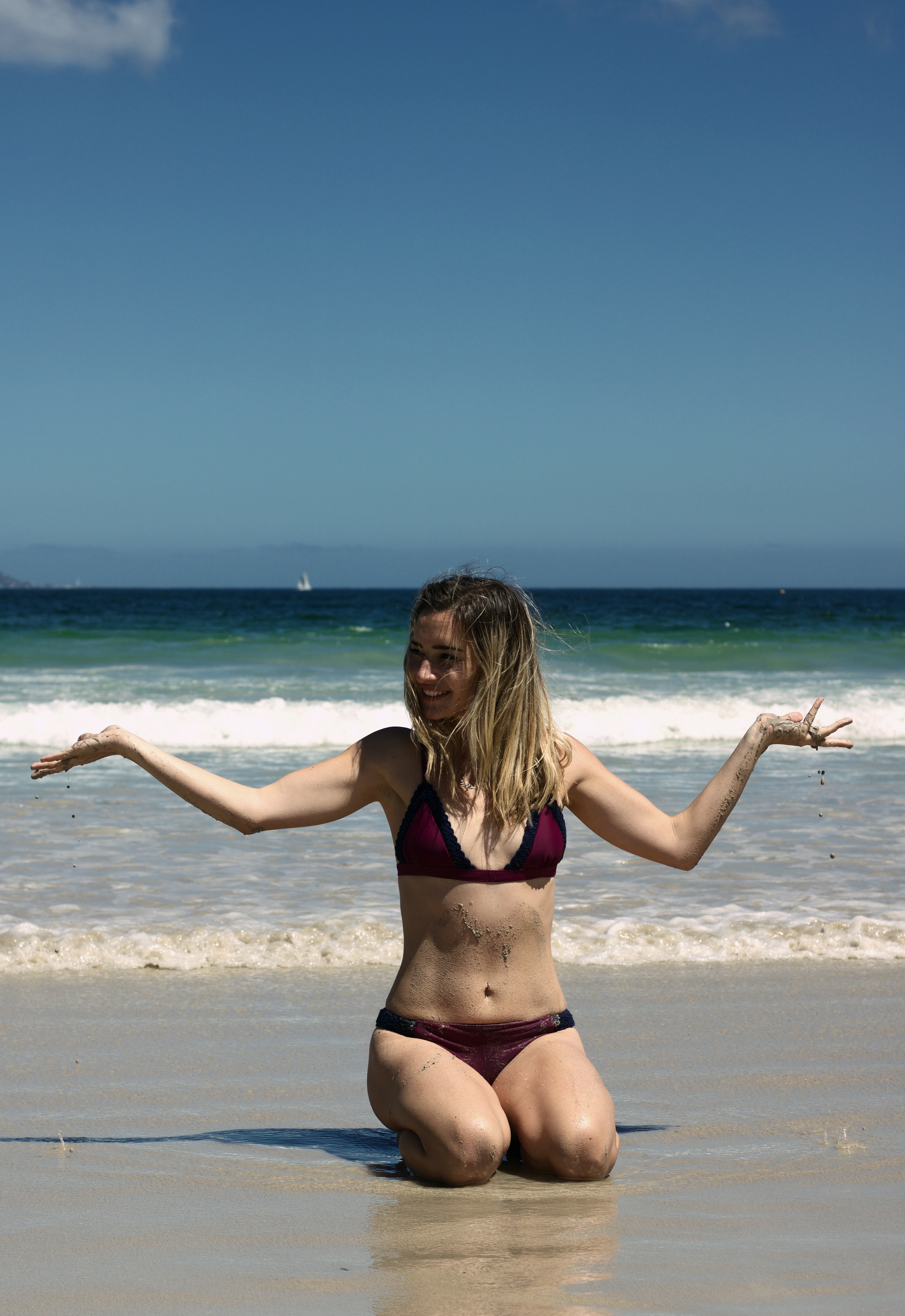 Woman Wearing Bikini on Seashore · Free Stock Photo