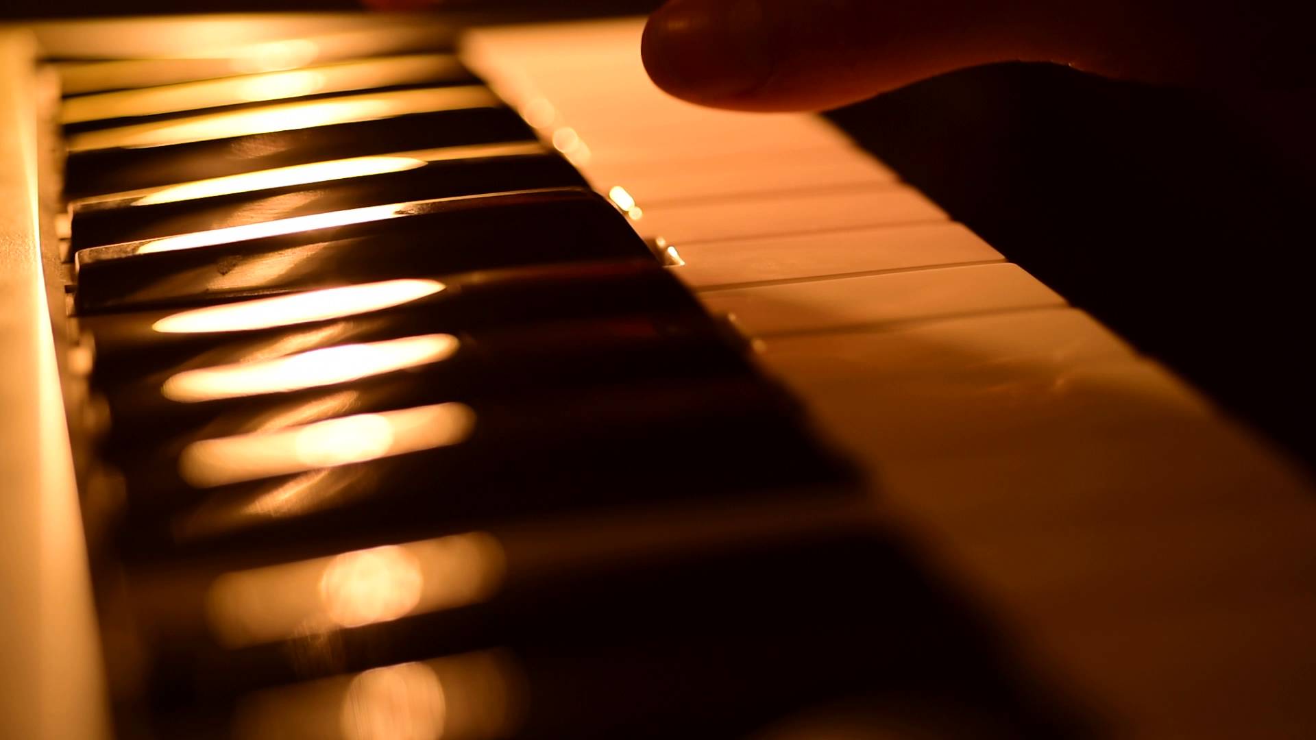 STOCK FOOTAGE - Playing Piano close up shot, beautiful golden light ...