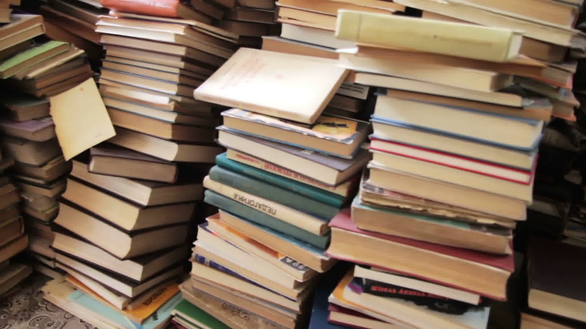 Pile of Books Scattered on the Floor in the Library Stock Video ...