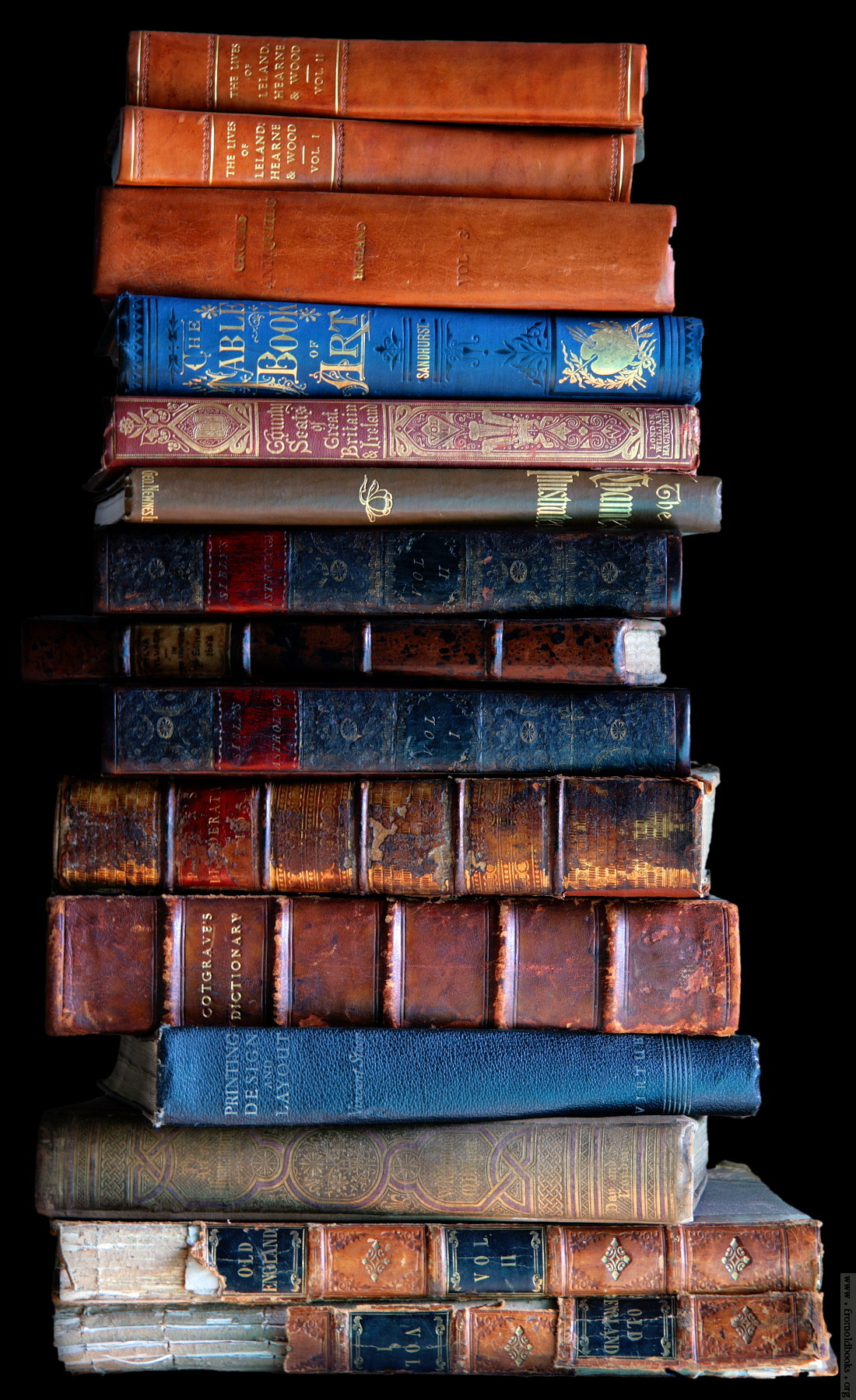 Stack of old books, dark background