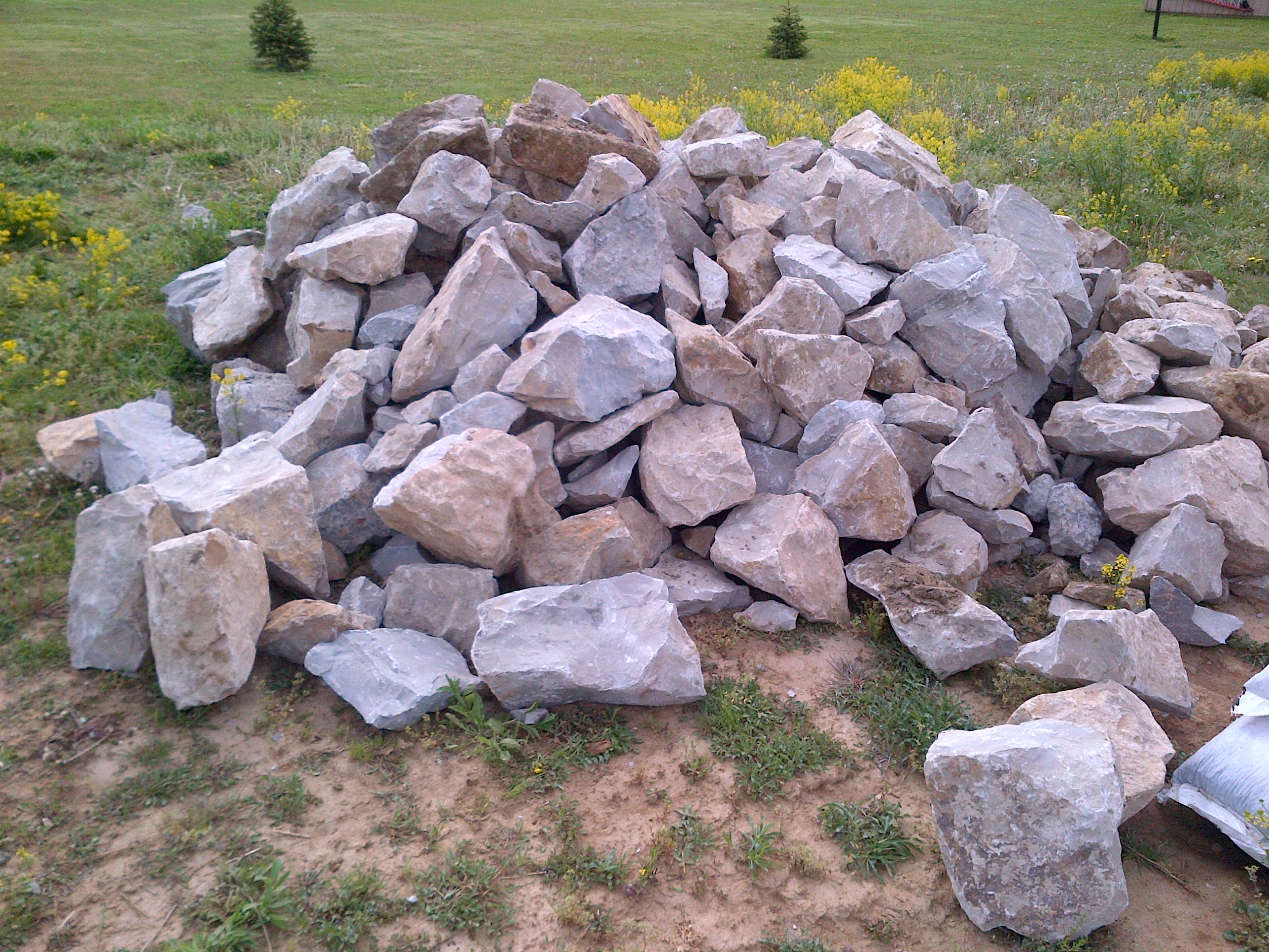 Moving 20 Ton of Rock and Boulders In Place - Old World Garden Farms