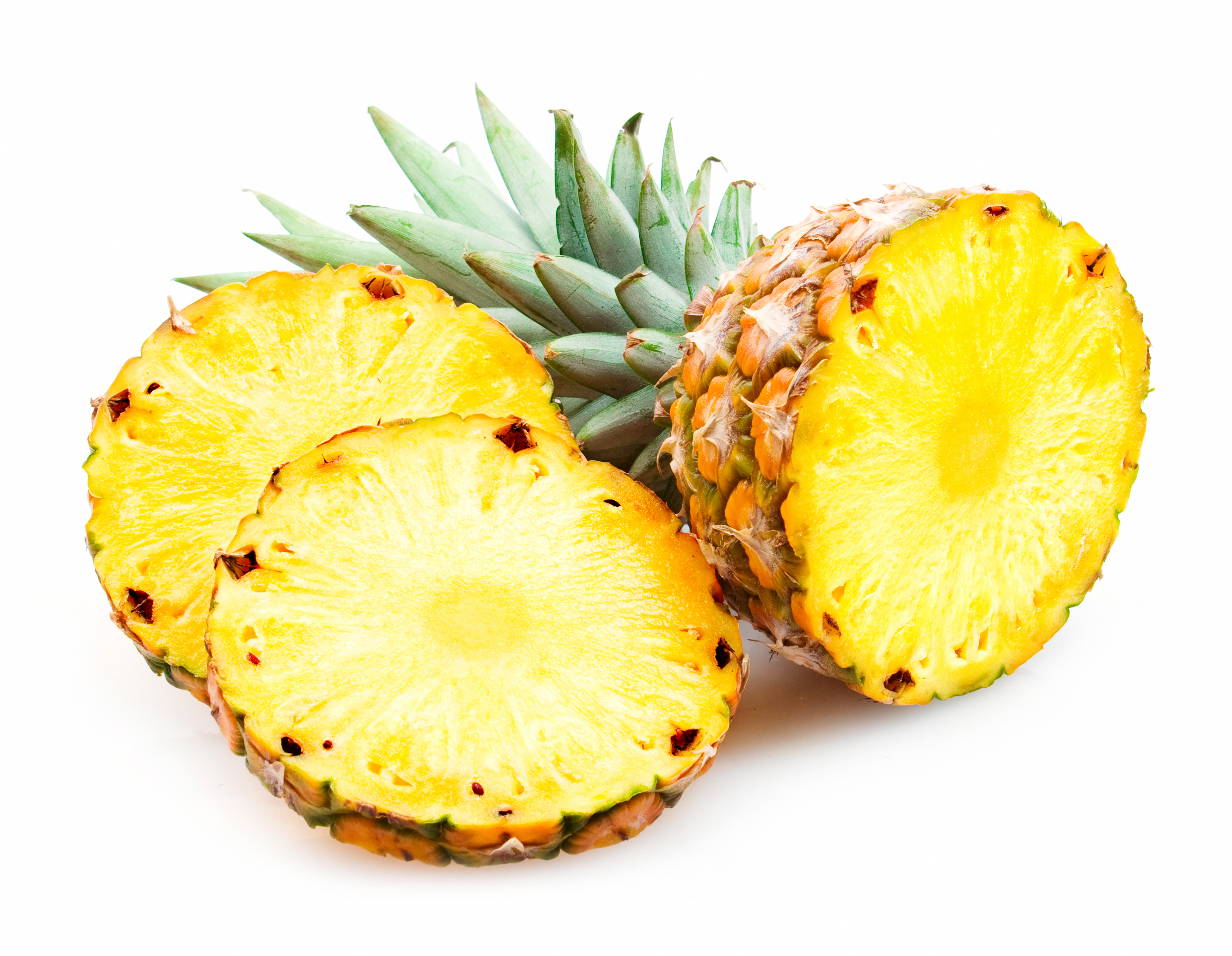 Pineapple with slices isolated on white photo