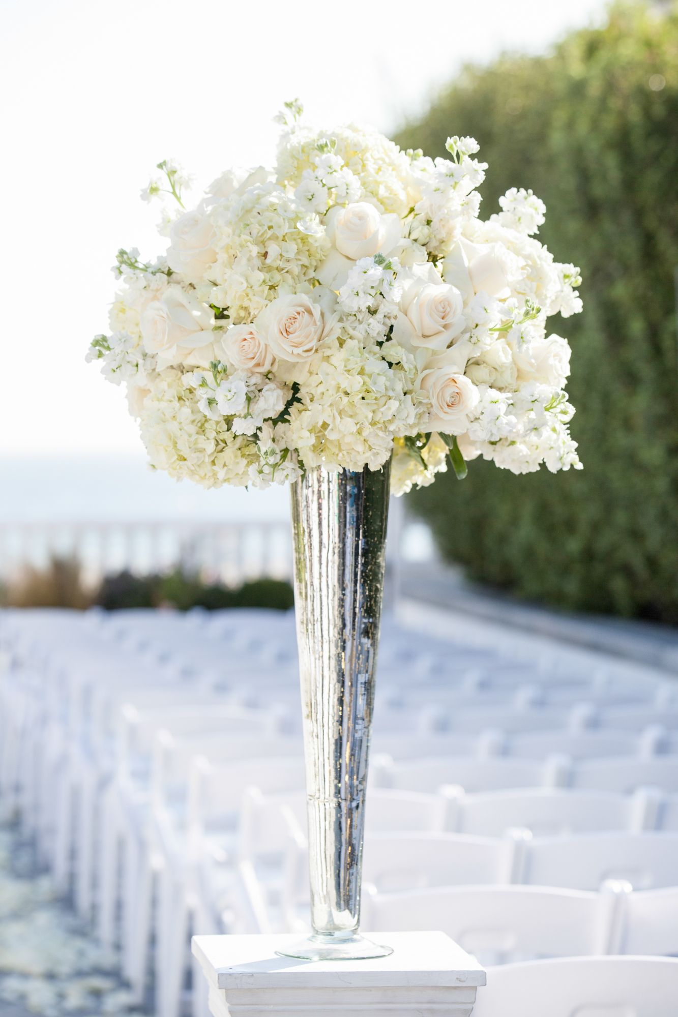 Tall White Rose and Hydrangea Centerpiece in a silver lined vase for ...