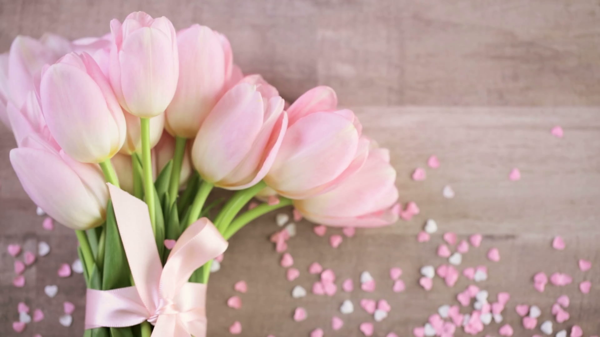Bouquet of pink tulips on a wood background. Stock Video Footage ...