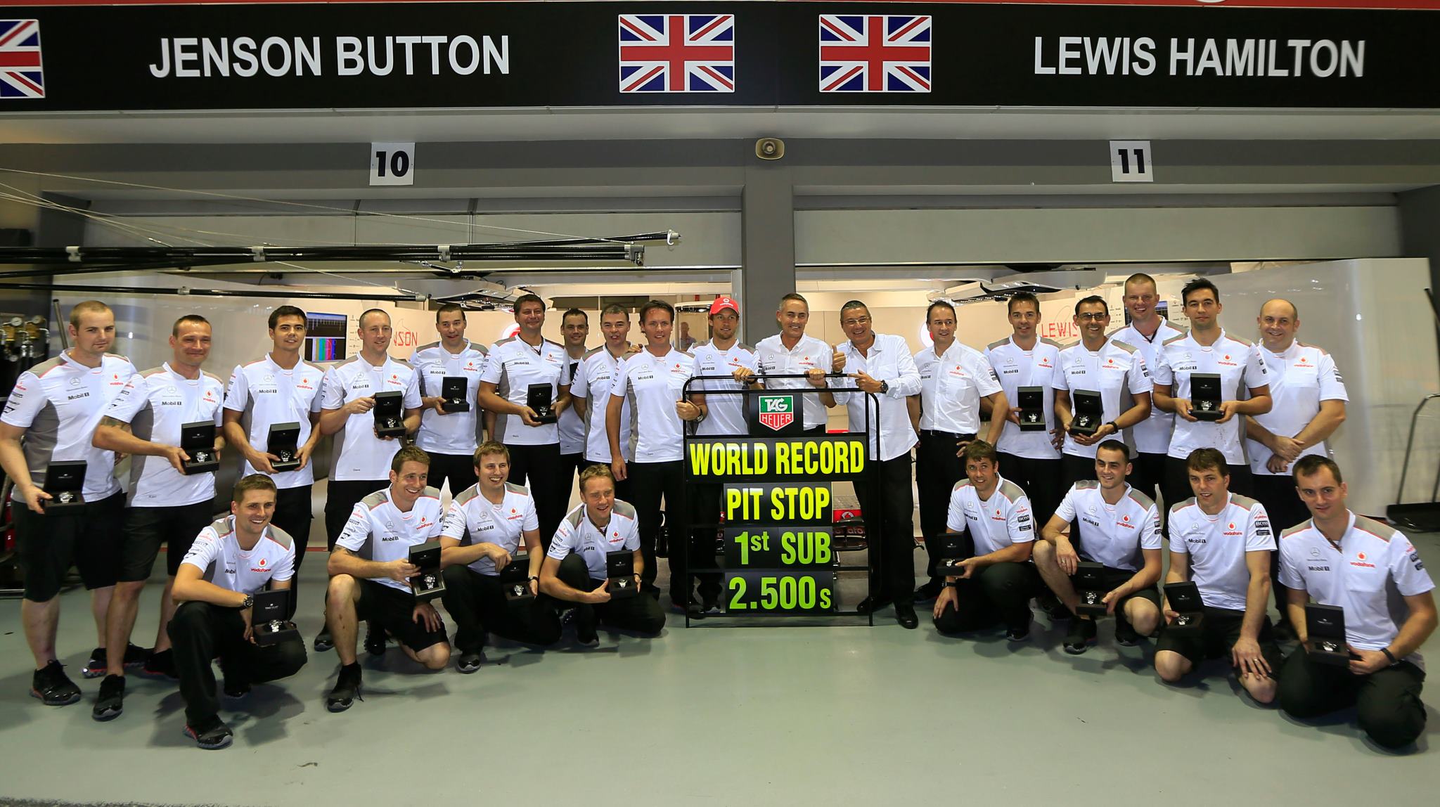World Record McLaren Pit Crew each get a TAG Heuer watch ...
