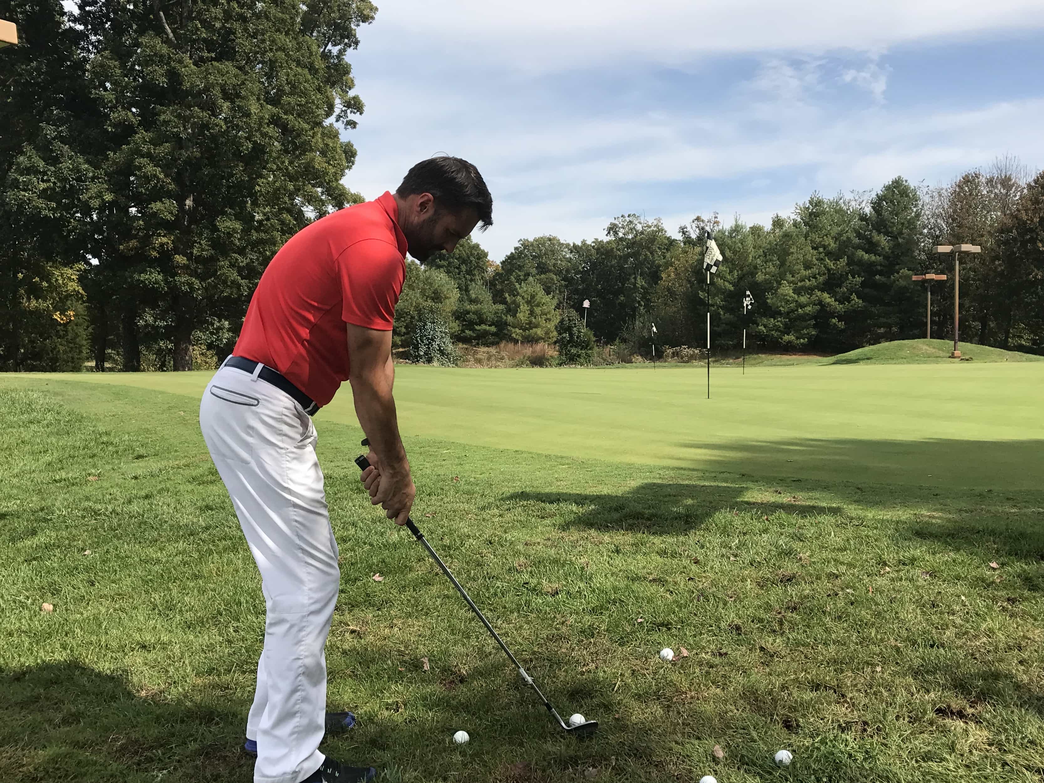 Player practicing golf photo