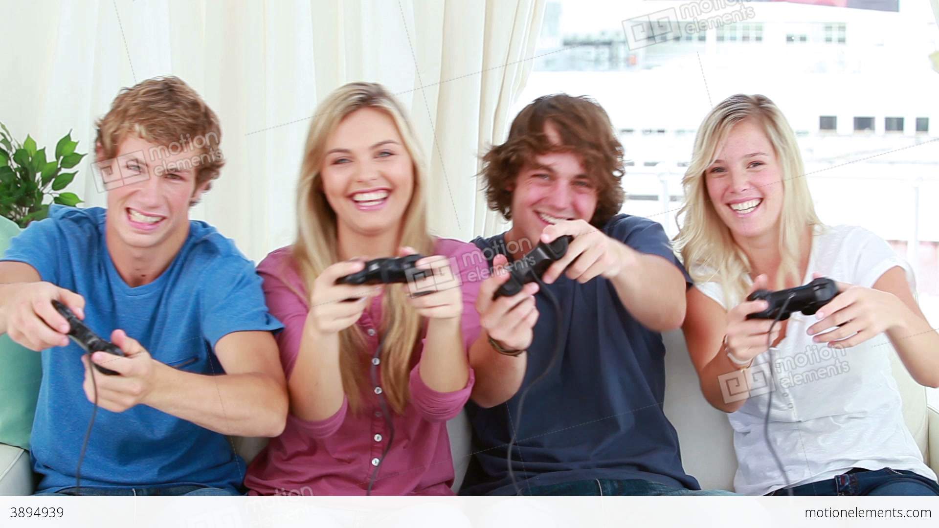 Happy Friends Playing Video Games Together Stock video footage | 3894939