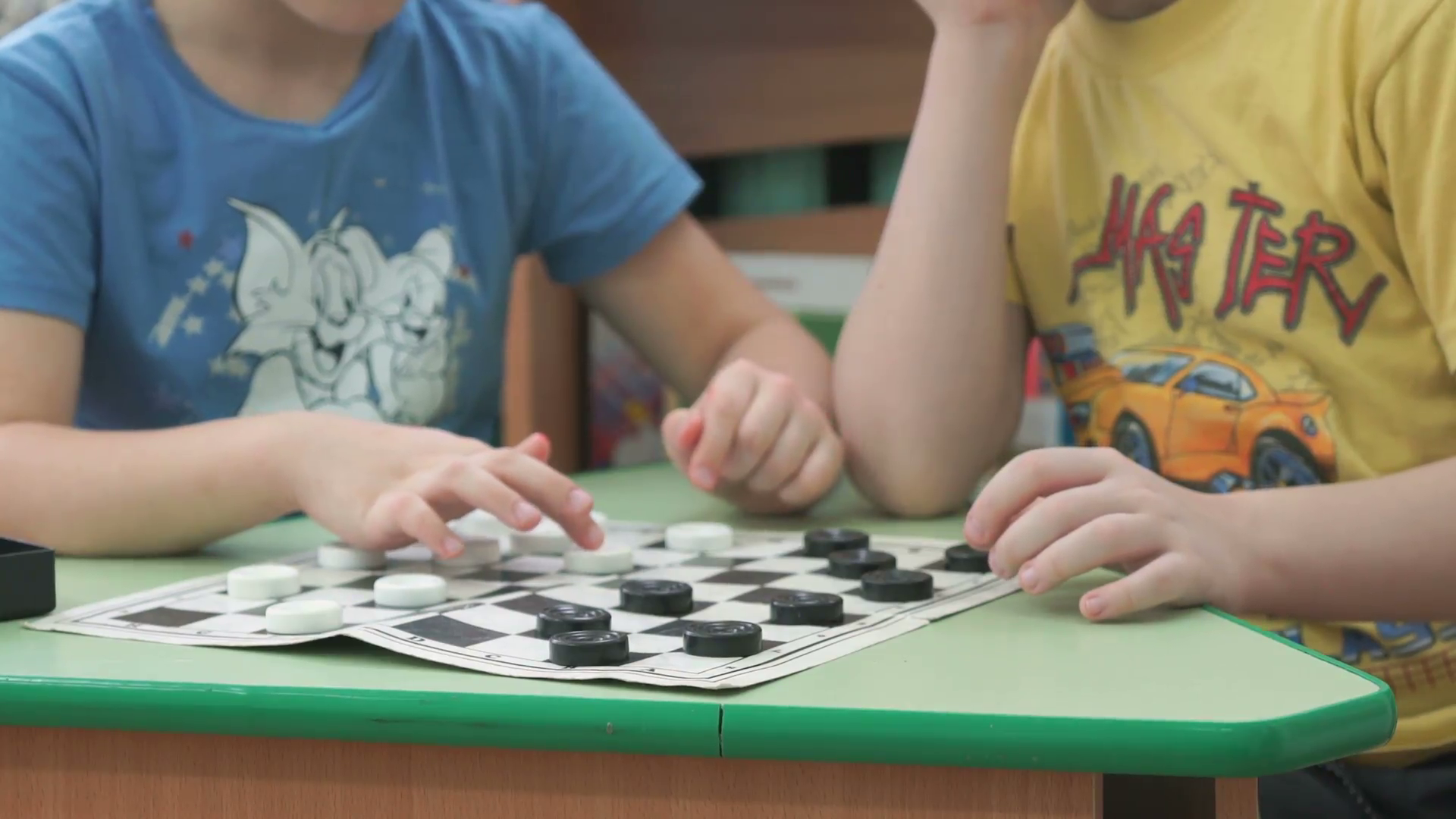 Children playing checkers games at a kindergarten Stock Video ...