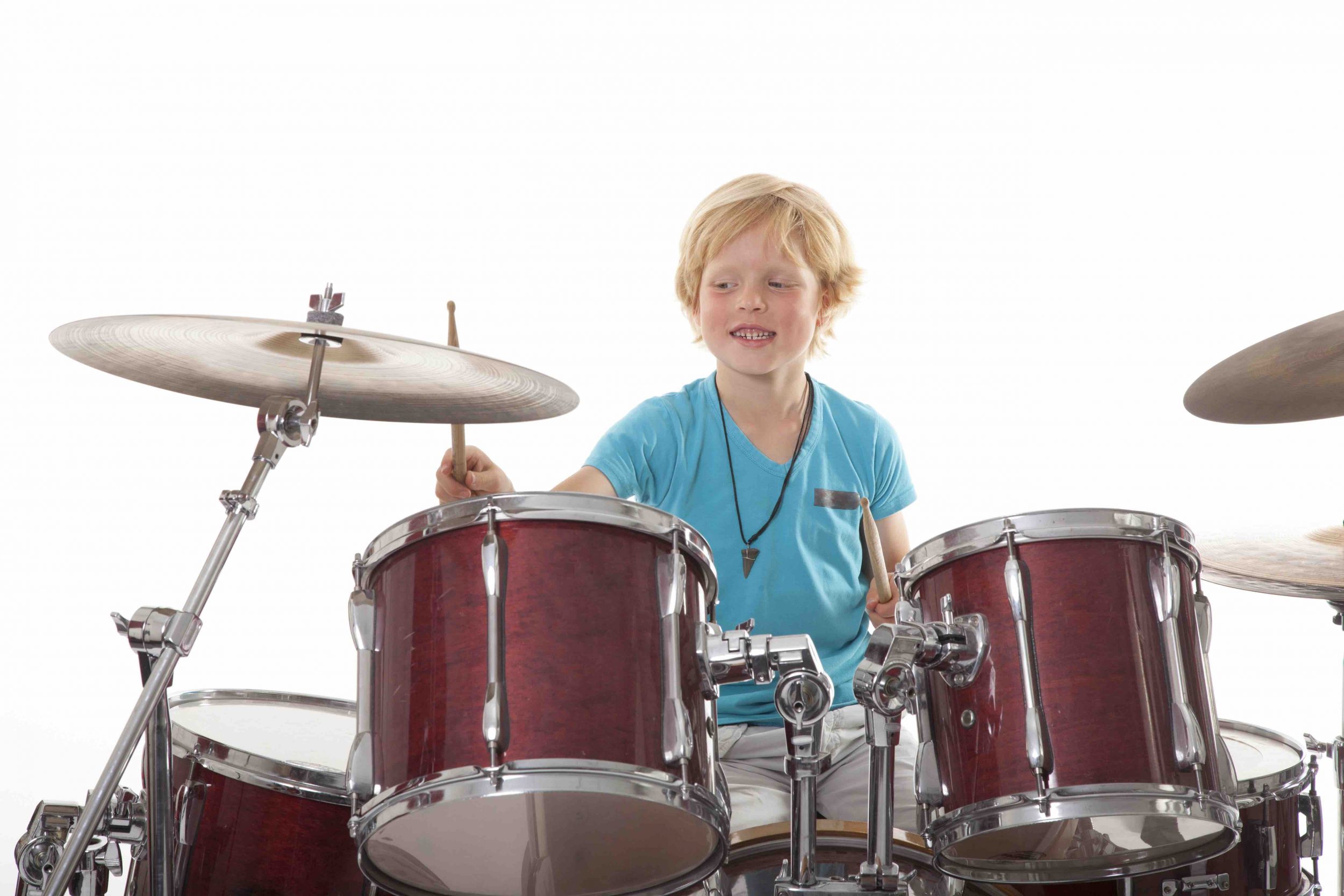 young boy playing drums - Manor Music