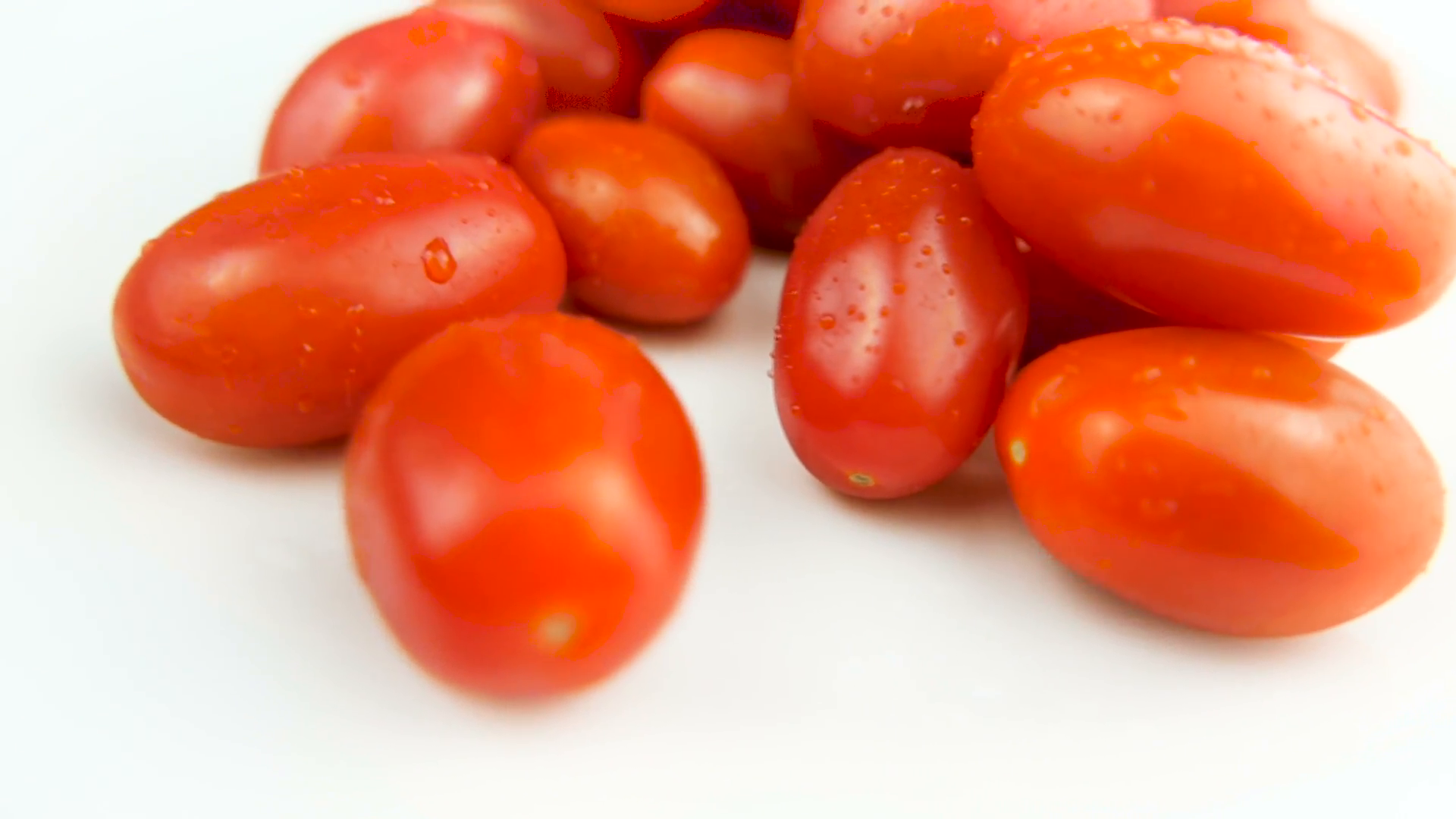 Fresh Plum Tomatoes Rotating on White Background Stock Video Footage ...