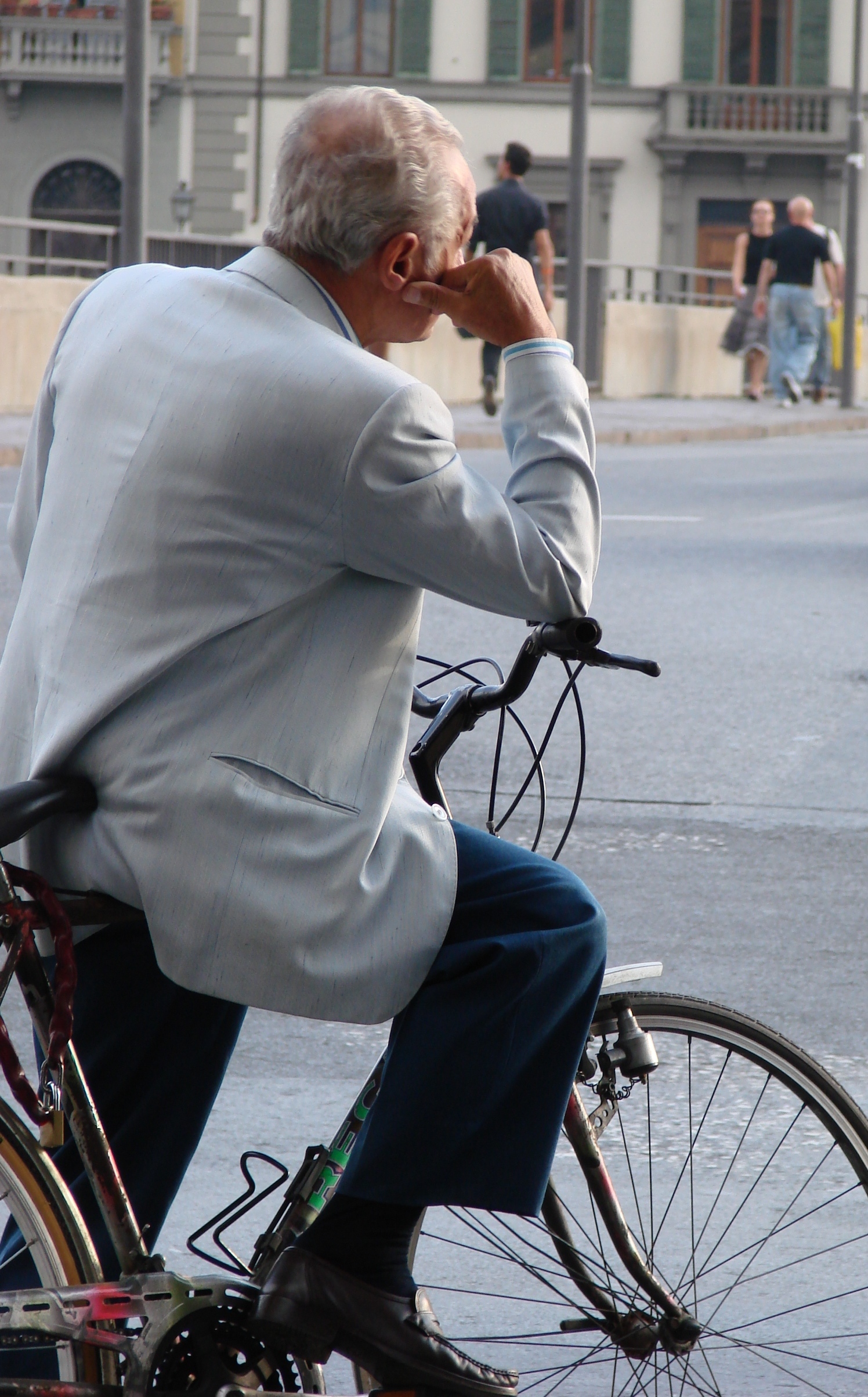 Pondering cyclist, italy photo