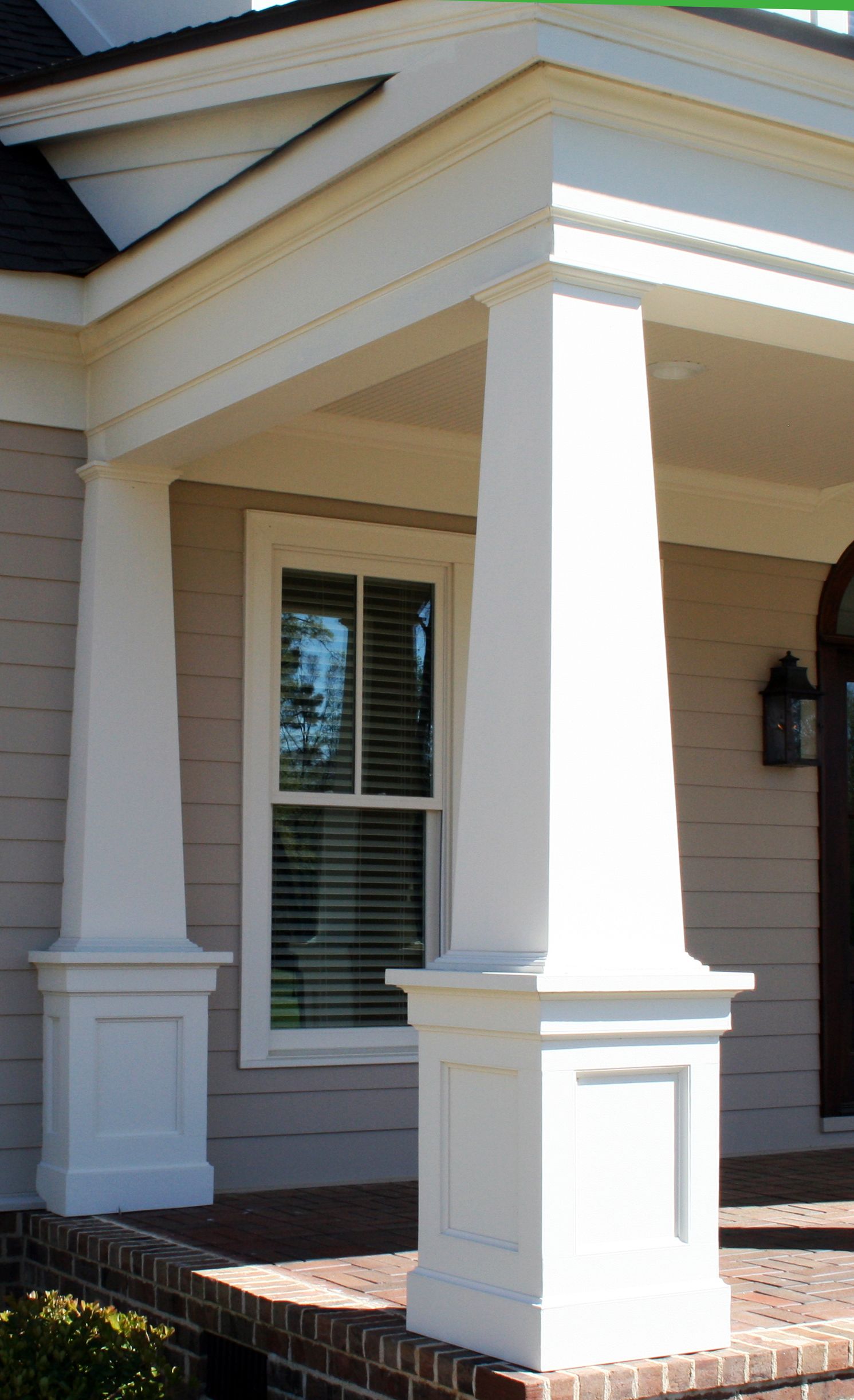 I love the horizontal/roof line trim work on this! The columns aren ...