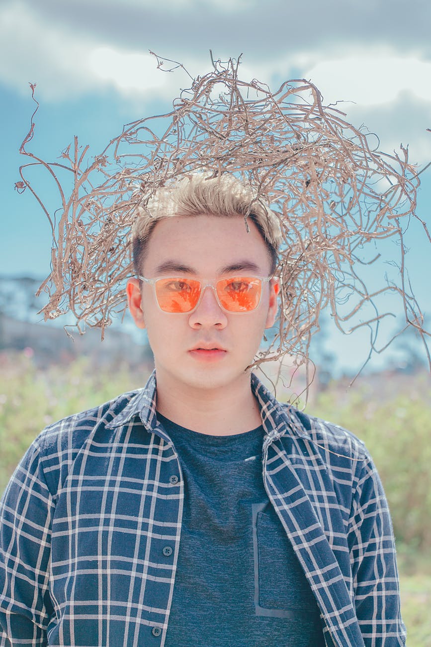 Portrait of a man in orange glasse photo