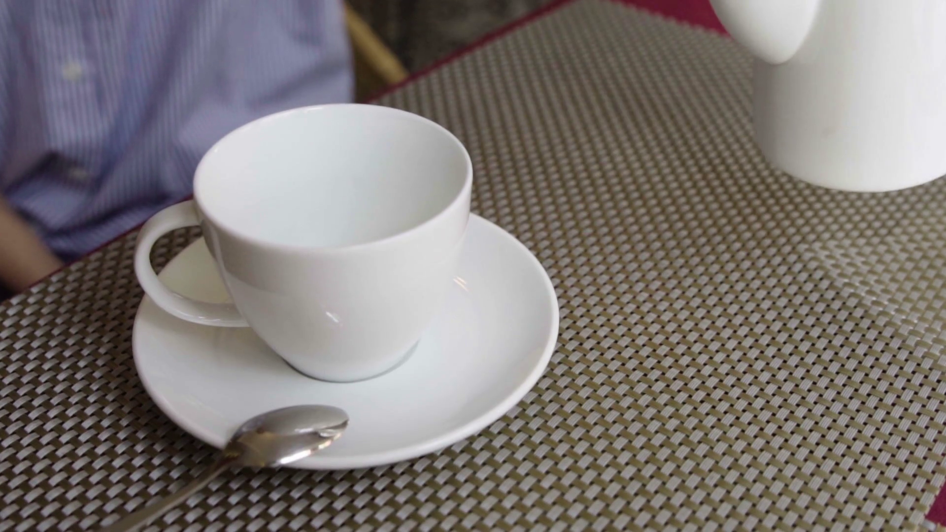 Close-up of woman pour the tea with teapot in cup Stock Video ...