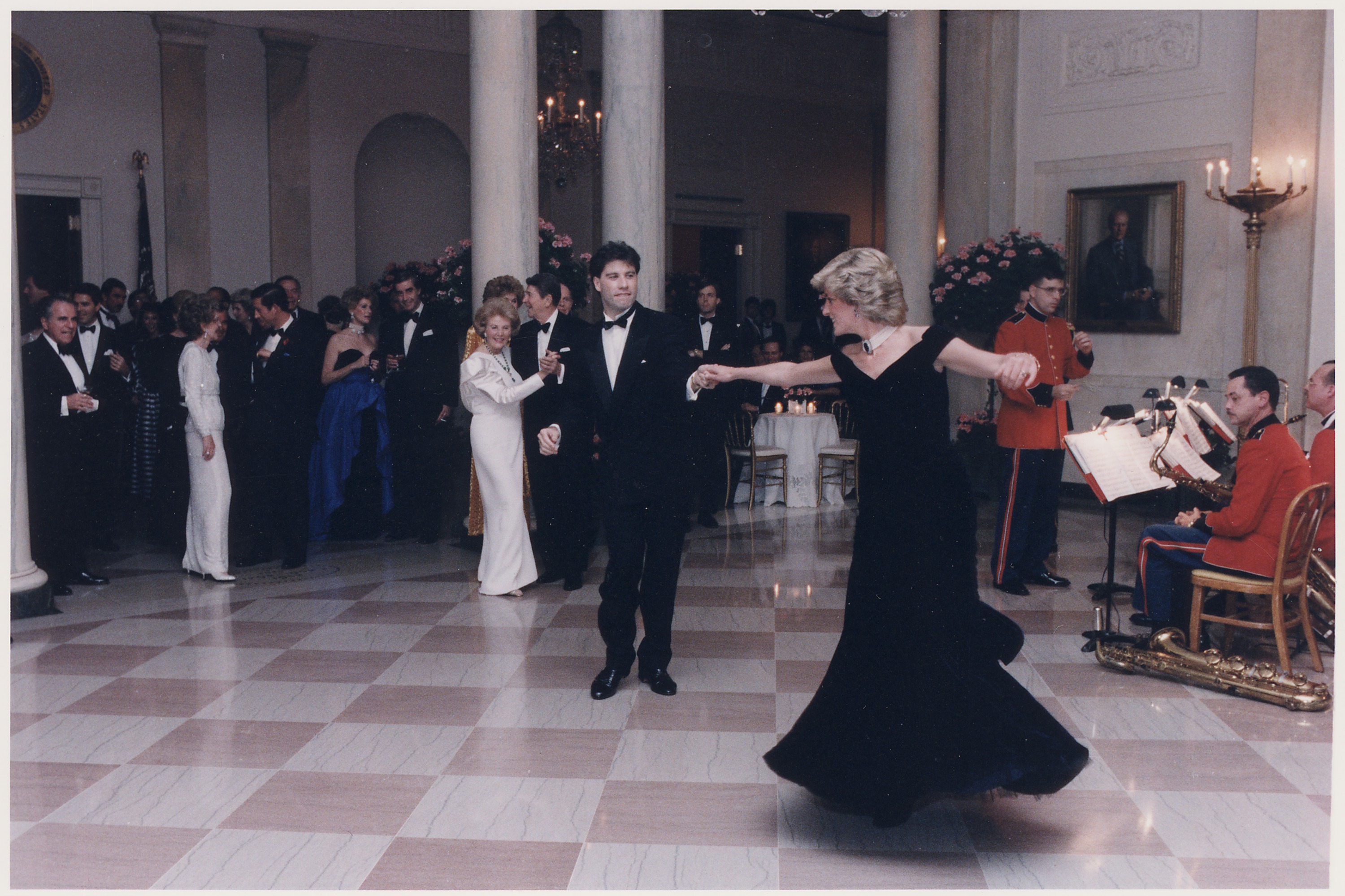 File:Photograph of Princess Diana dancing with John Travolta at a ...