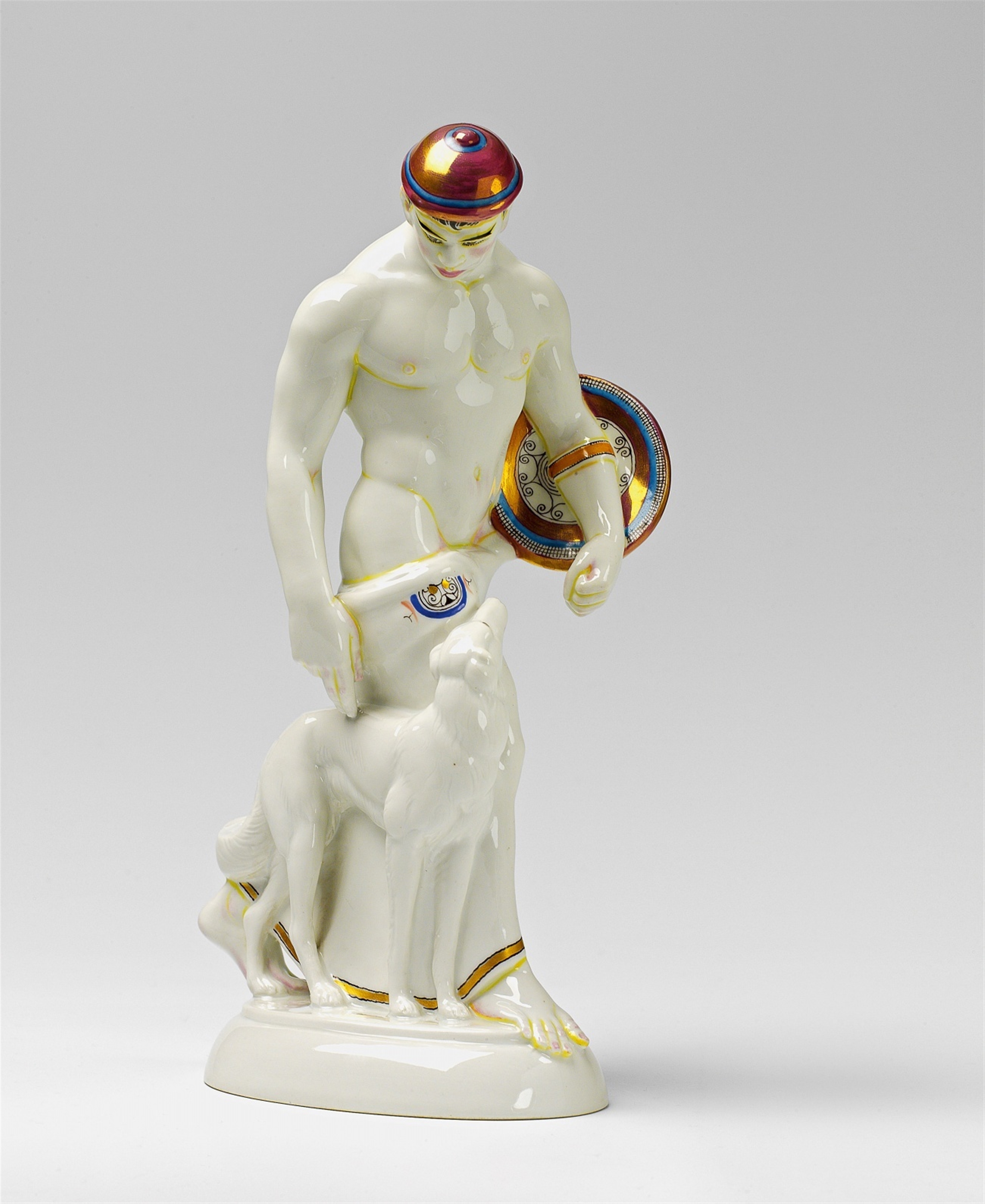 A Berlin KPM porcelain figure of a Gothic man with a dog ...