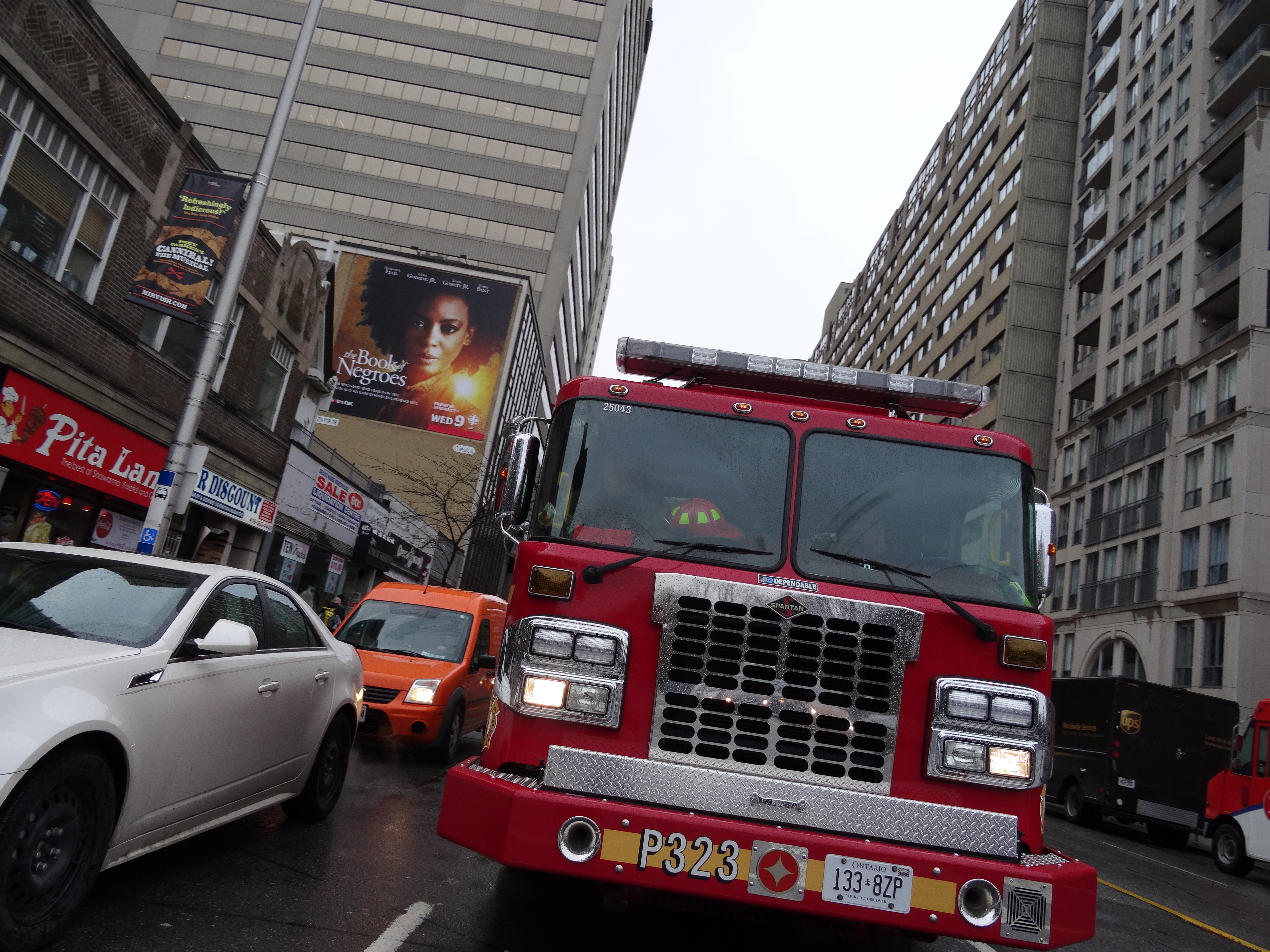 Pumper 323 at the intersection of sherbourne and bloor, 2014 12 17 (2) photo