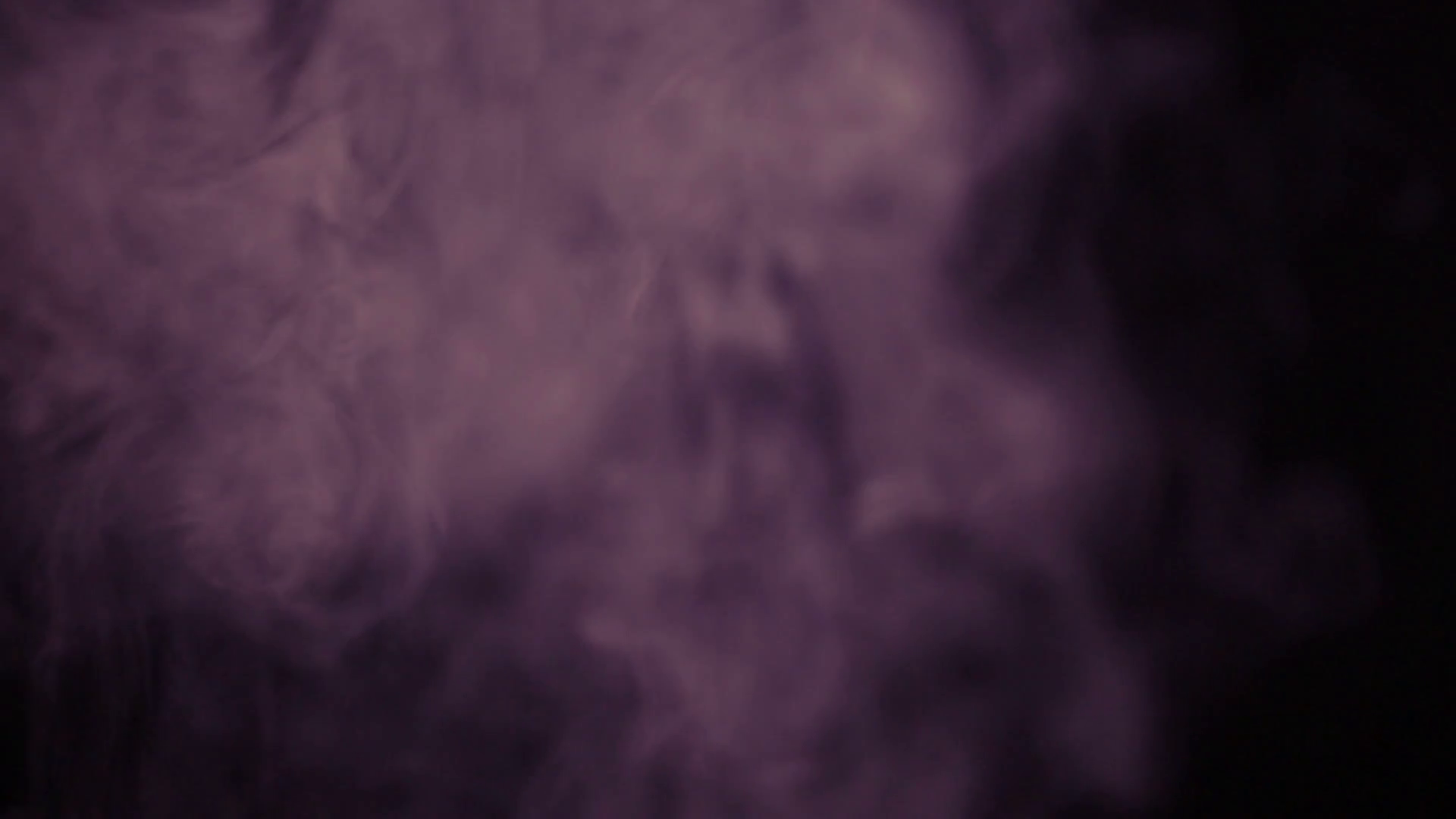 Purple smoke with a black background. Stock Video Footage - Videoblocks