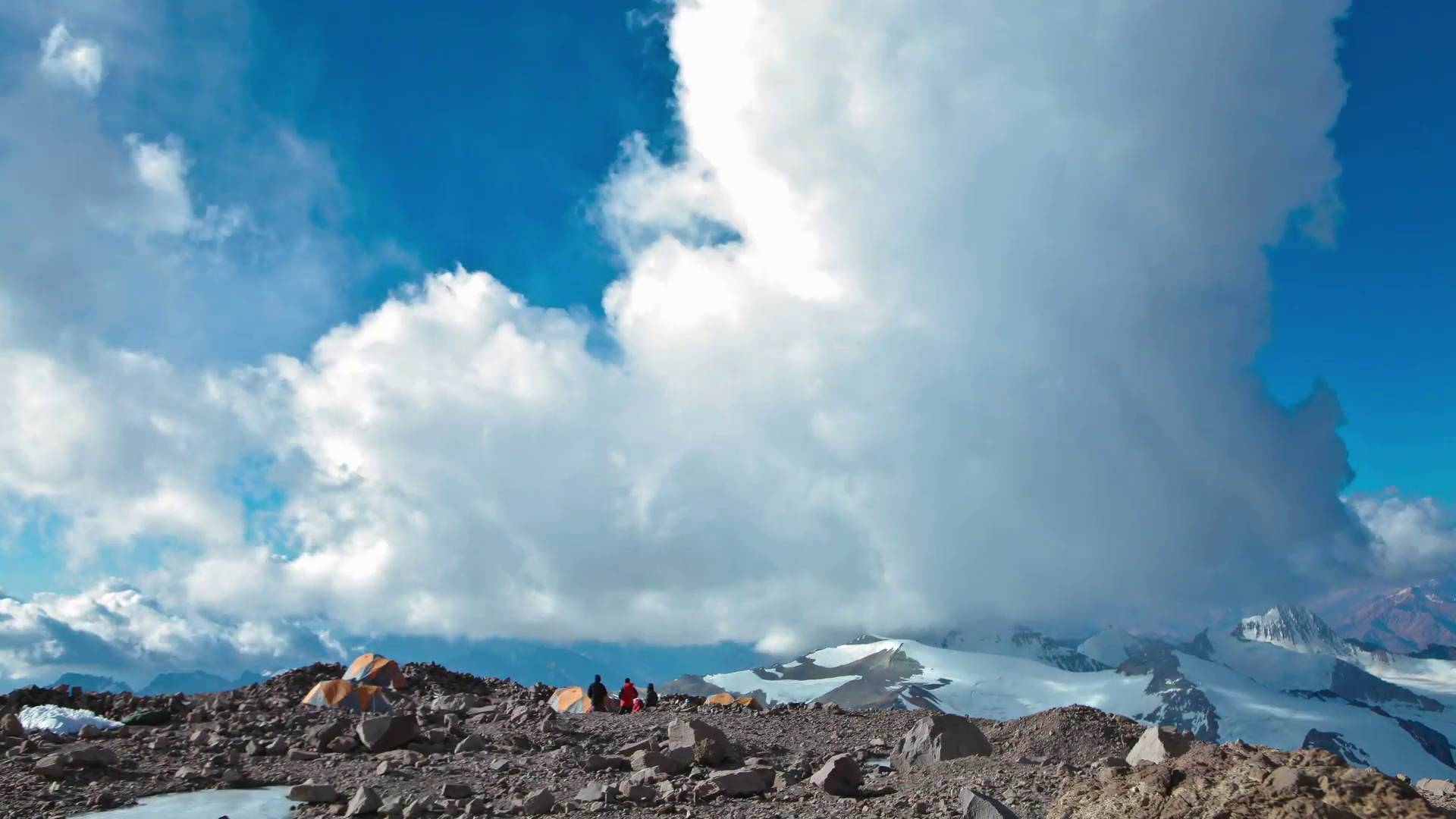 Aconcagua Time lapse - racing clouds at camp with climbers Stock ...