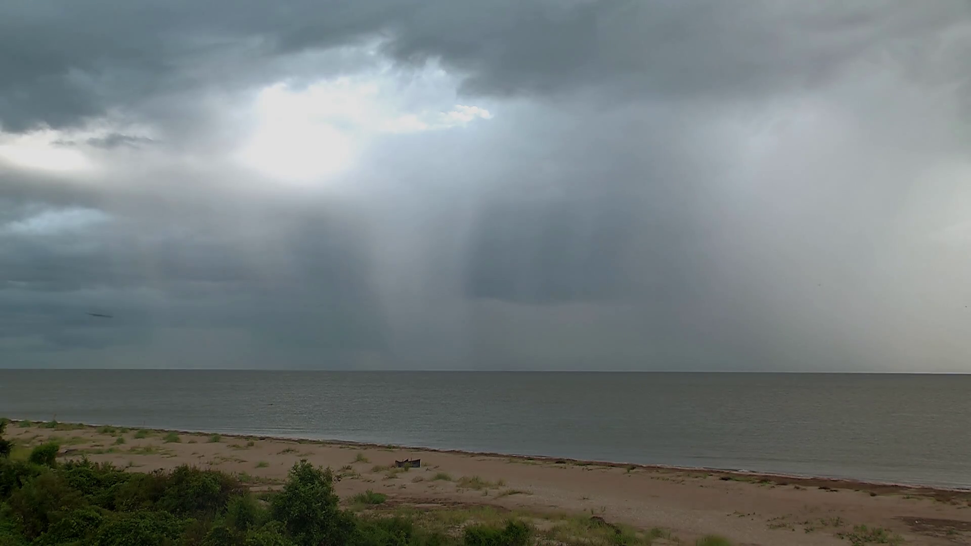 Sun Illuminates Rain Storm Over Ocean Horizon Stock Video Footage ...