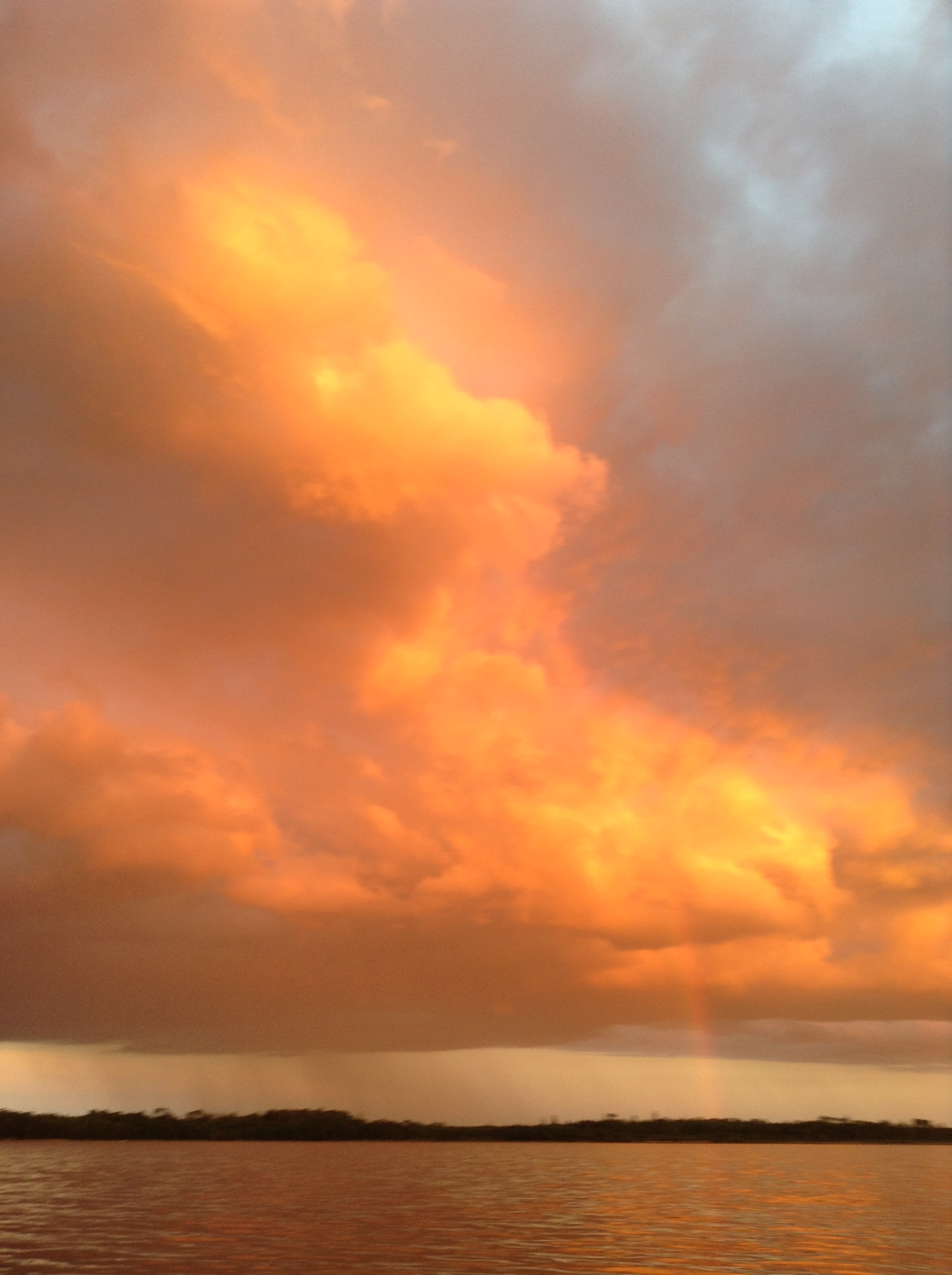 Sunset, Clouds and Rainbow, the beauty after the storm - RE Magazine