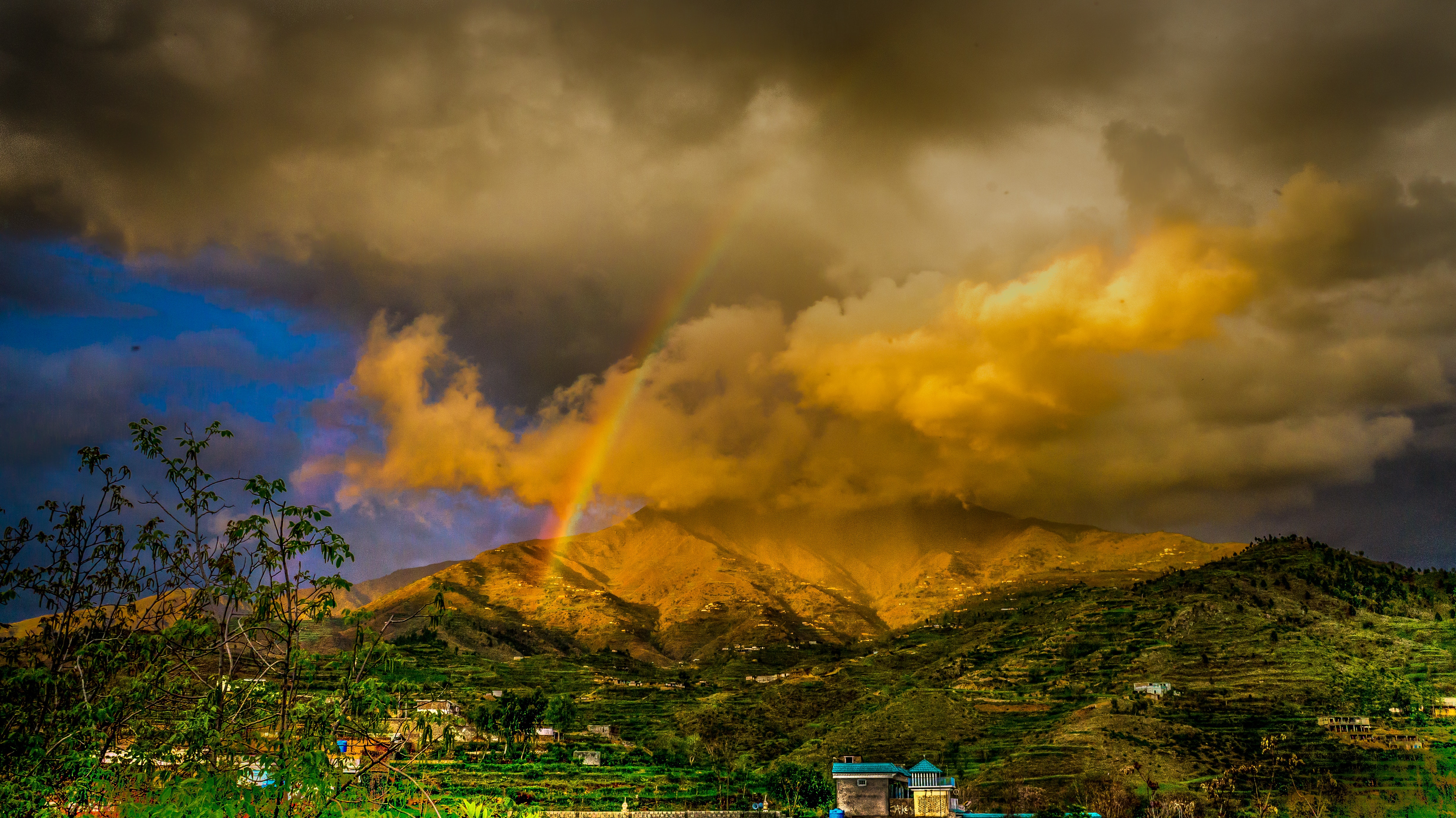 Rainbow on top of the mountain photo