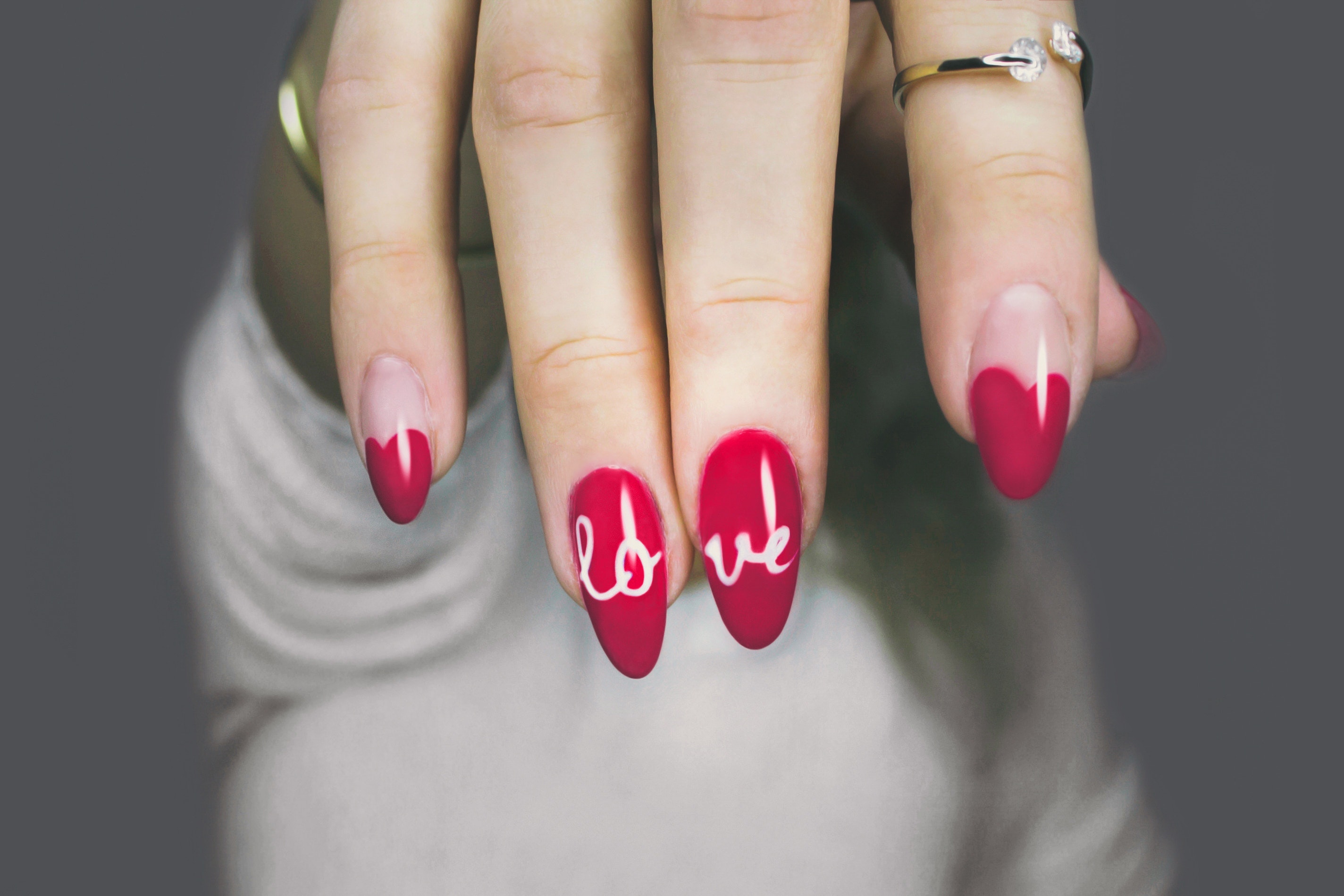 Red and white manicure with love print photo
