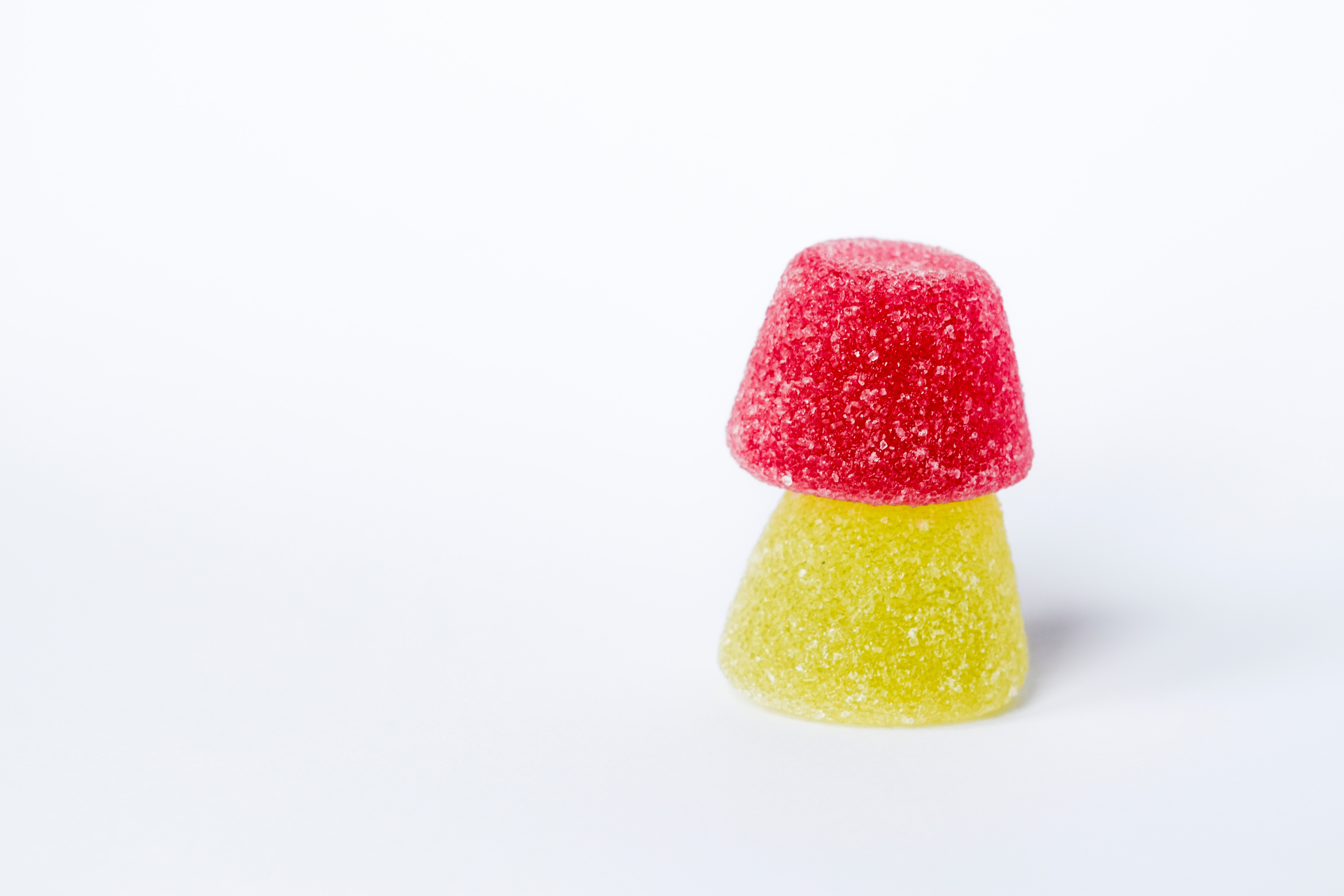Red and yellow gummy candies photo