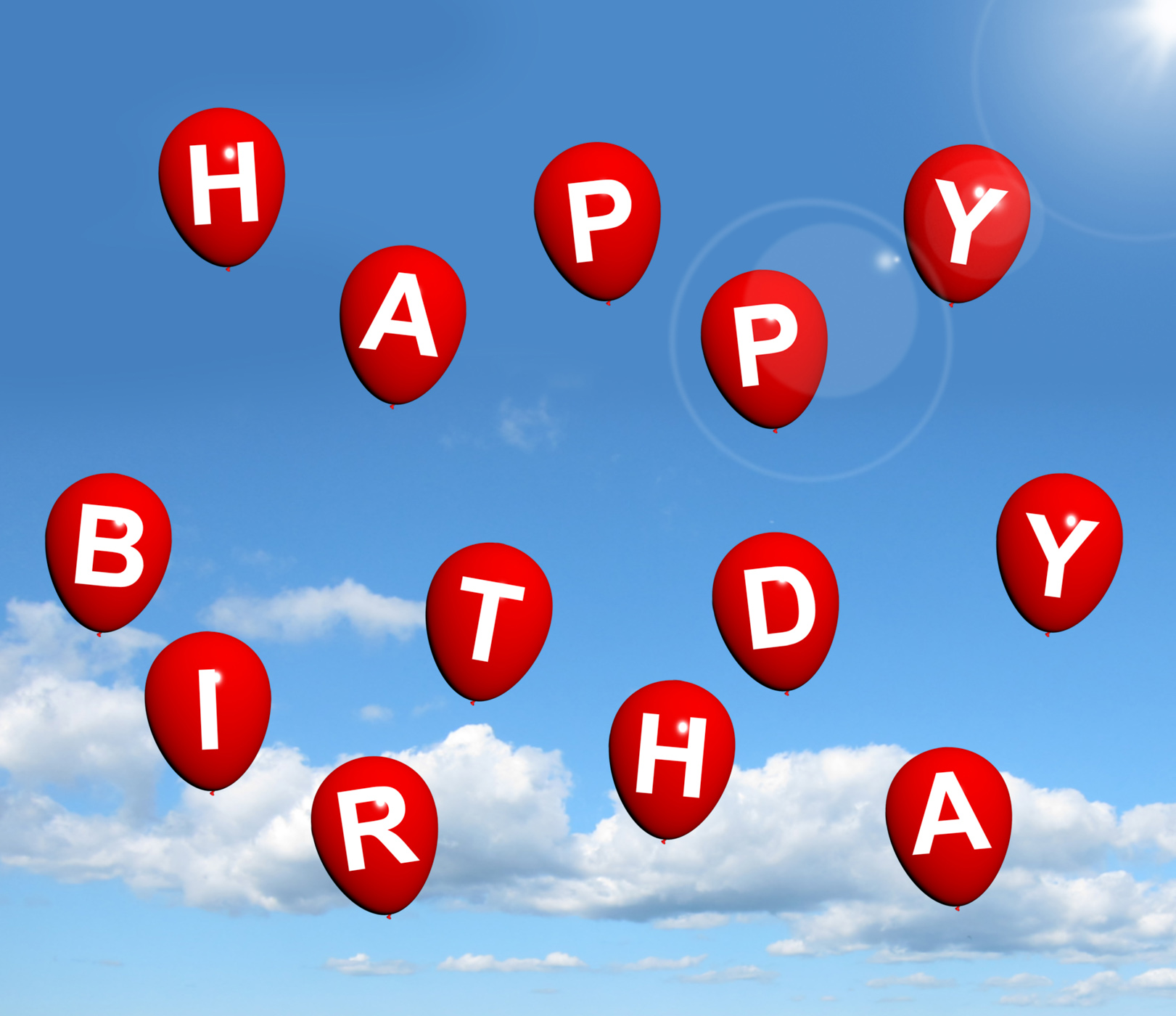 Red balloons in the sky spelling happy birthday photo