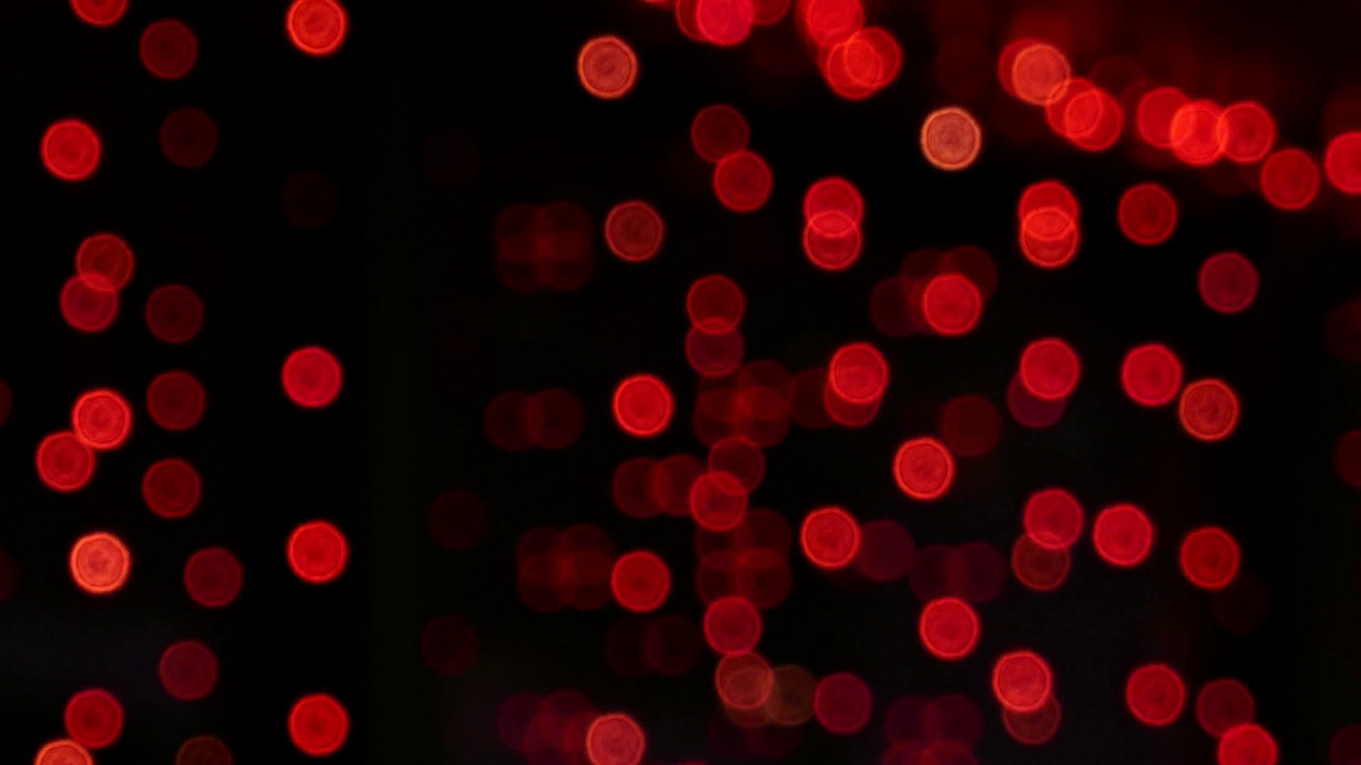 Red bokeh lights out of focus... Stock Video Footage - Videoblocks