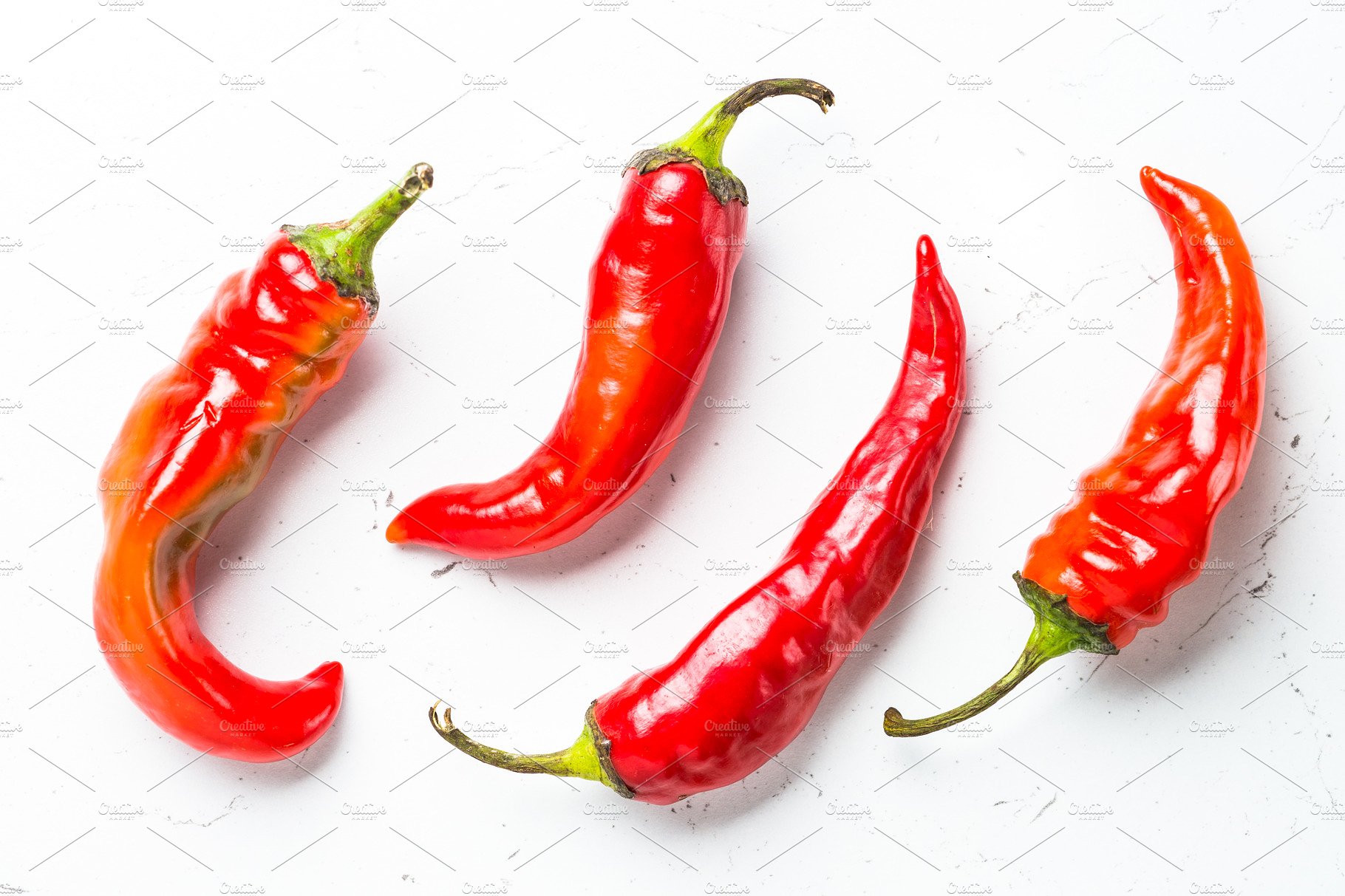 Red hot chilli pepper on white. ~ Photos ~ Creative Market