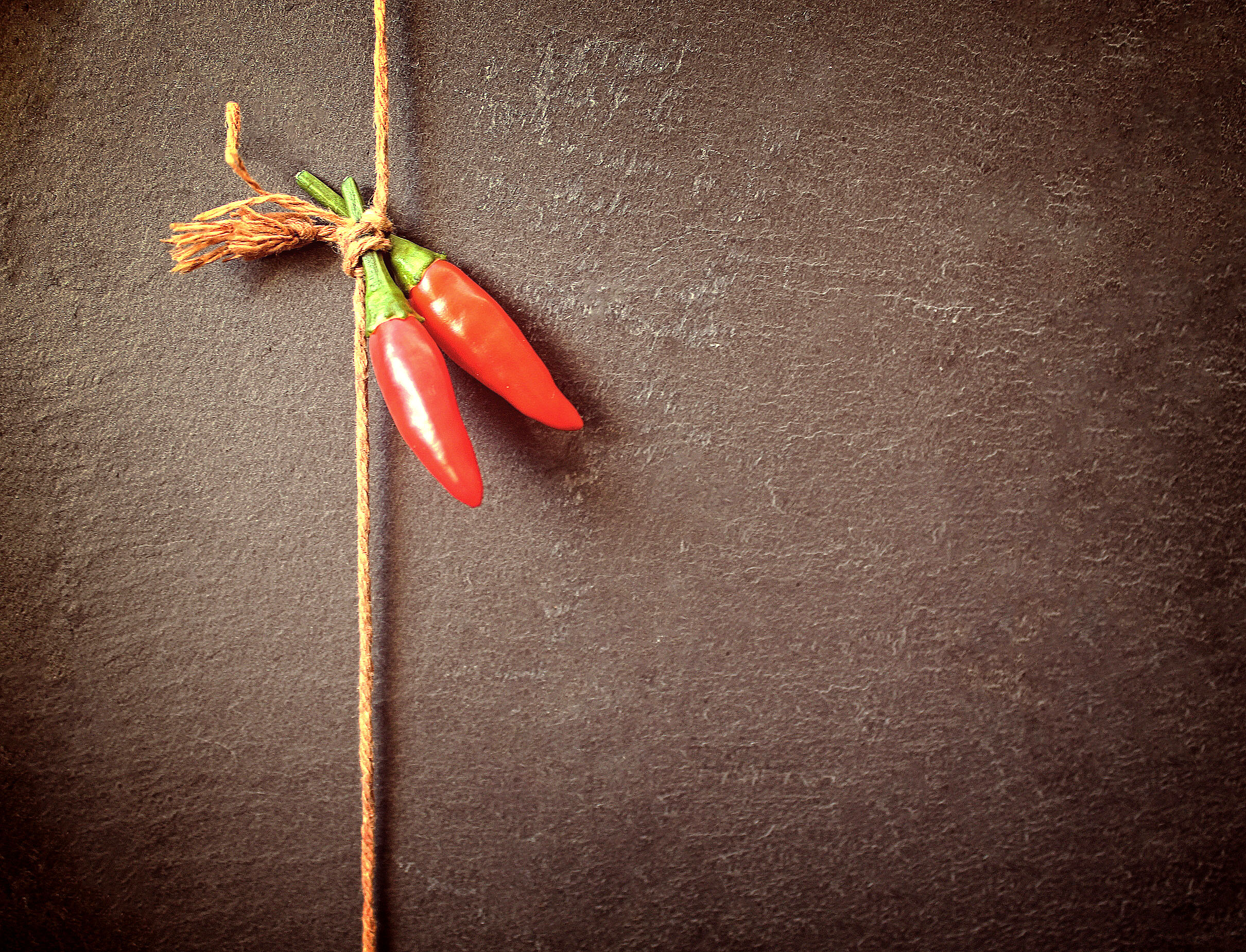 Red chilli peppers on a string photo