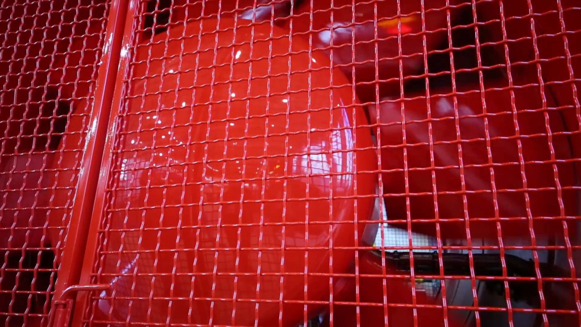 Big red metal shiny vertiginous propeller in red grid Stock Video ...