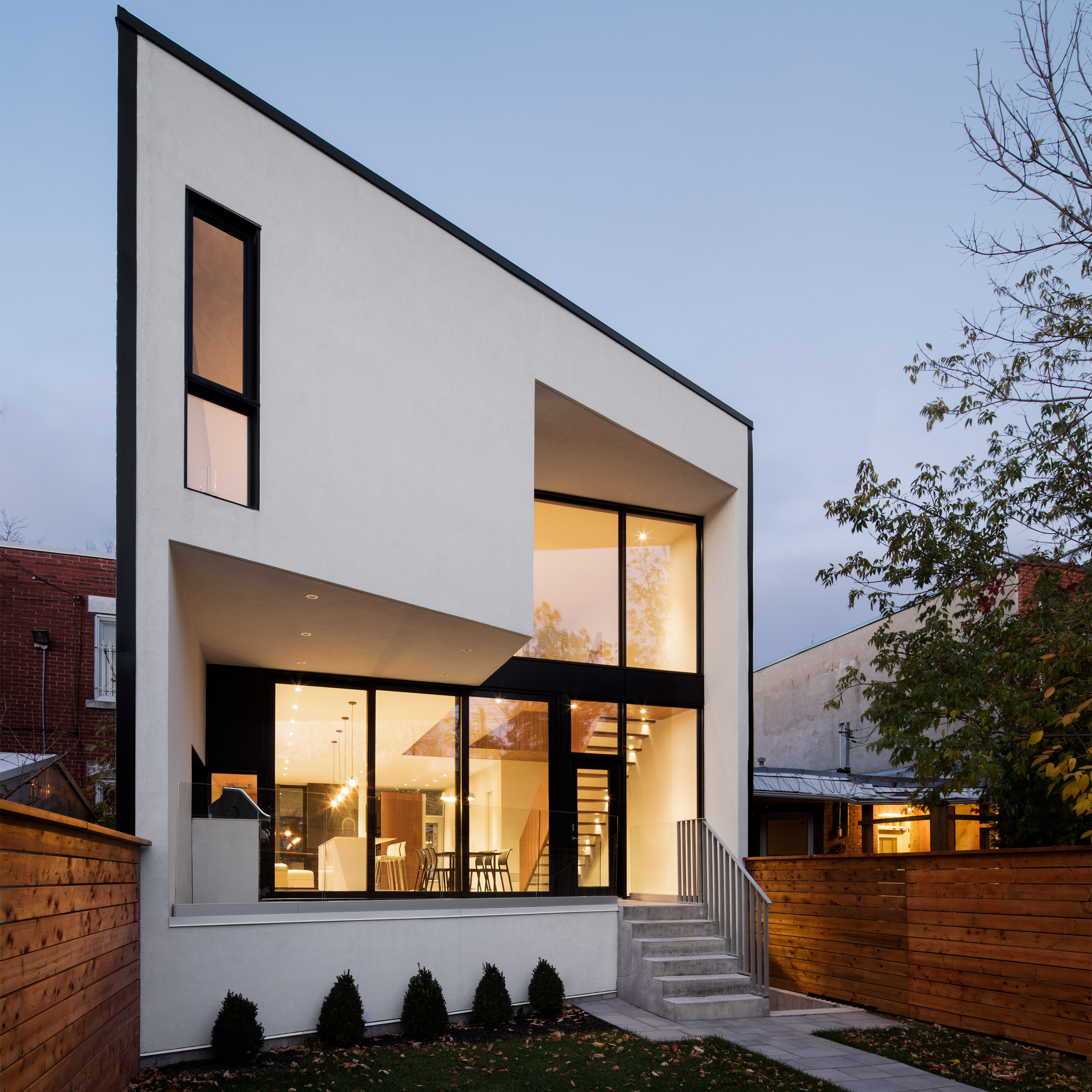 Architecture Microclimat builds minimal house in traditional ...