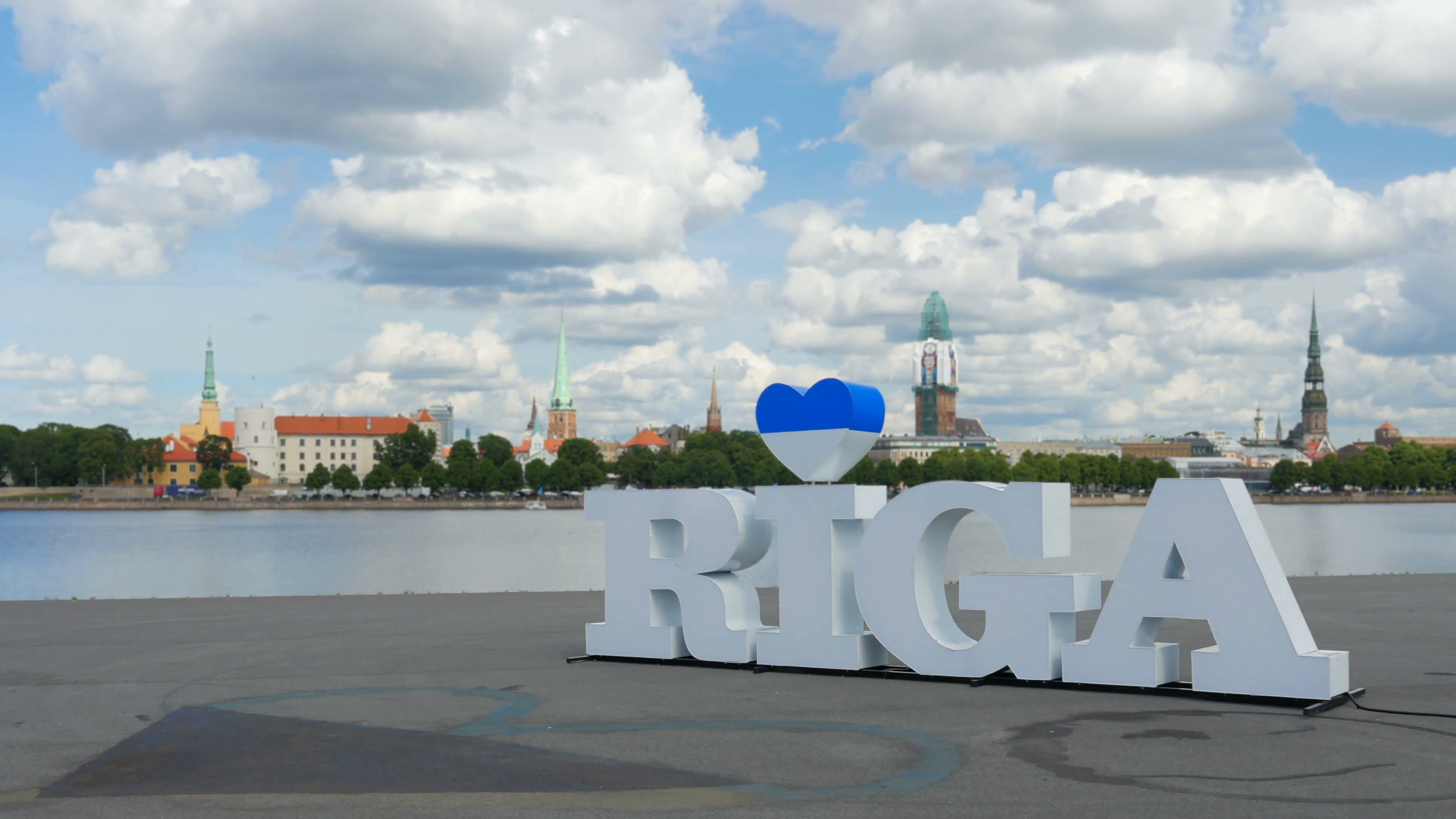 Riga sign, majestic clouds, city view, timelapse, zoom in, 4k Stock ...