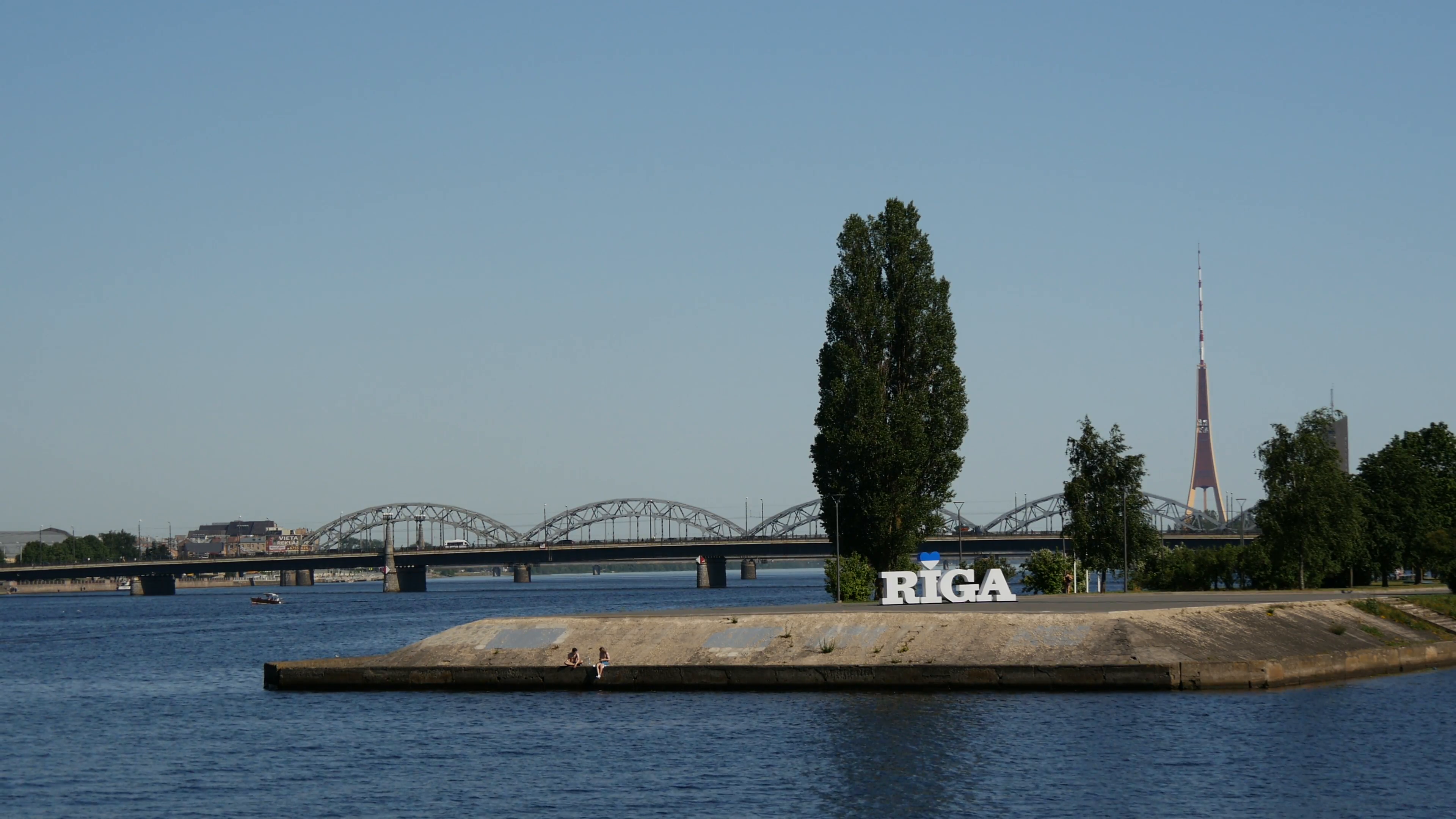 Riga sign at River Daugava, Railway Bridge and Riga Radio and TV ...