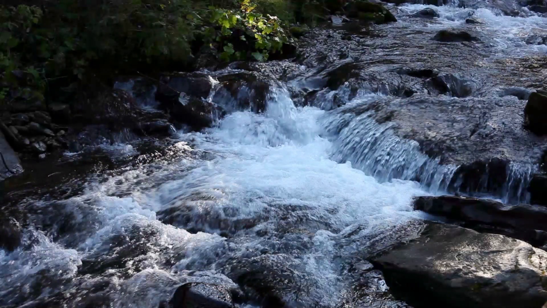 Mountain river flowing through stones Stock Video Footage - Videoblocks