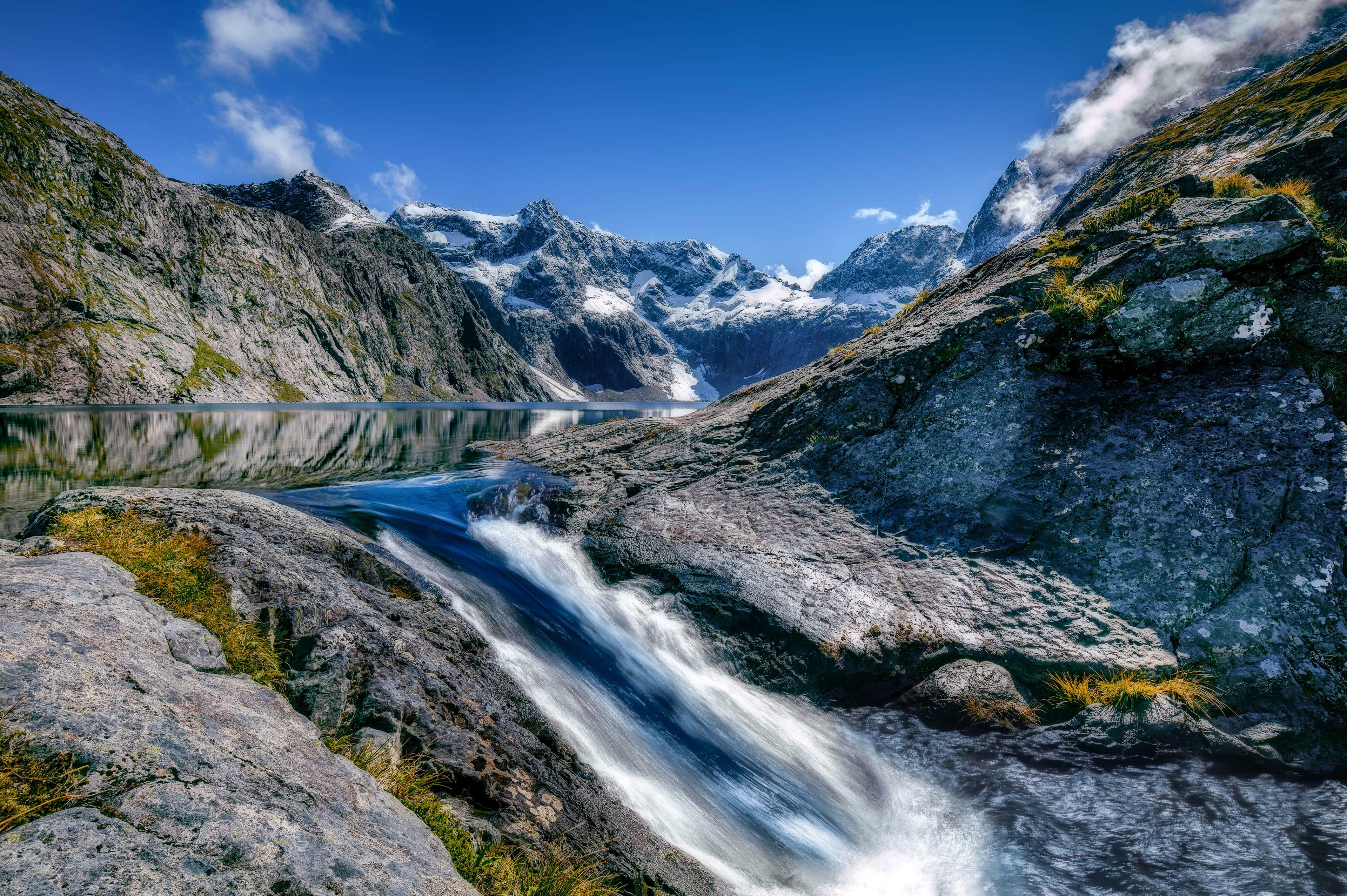 Mountains and River landscape in Fiordland National Park, New ...