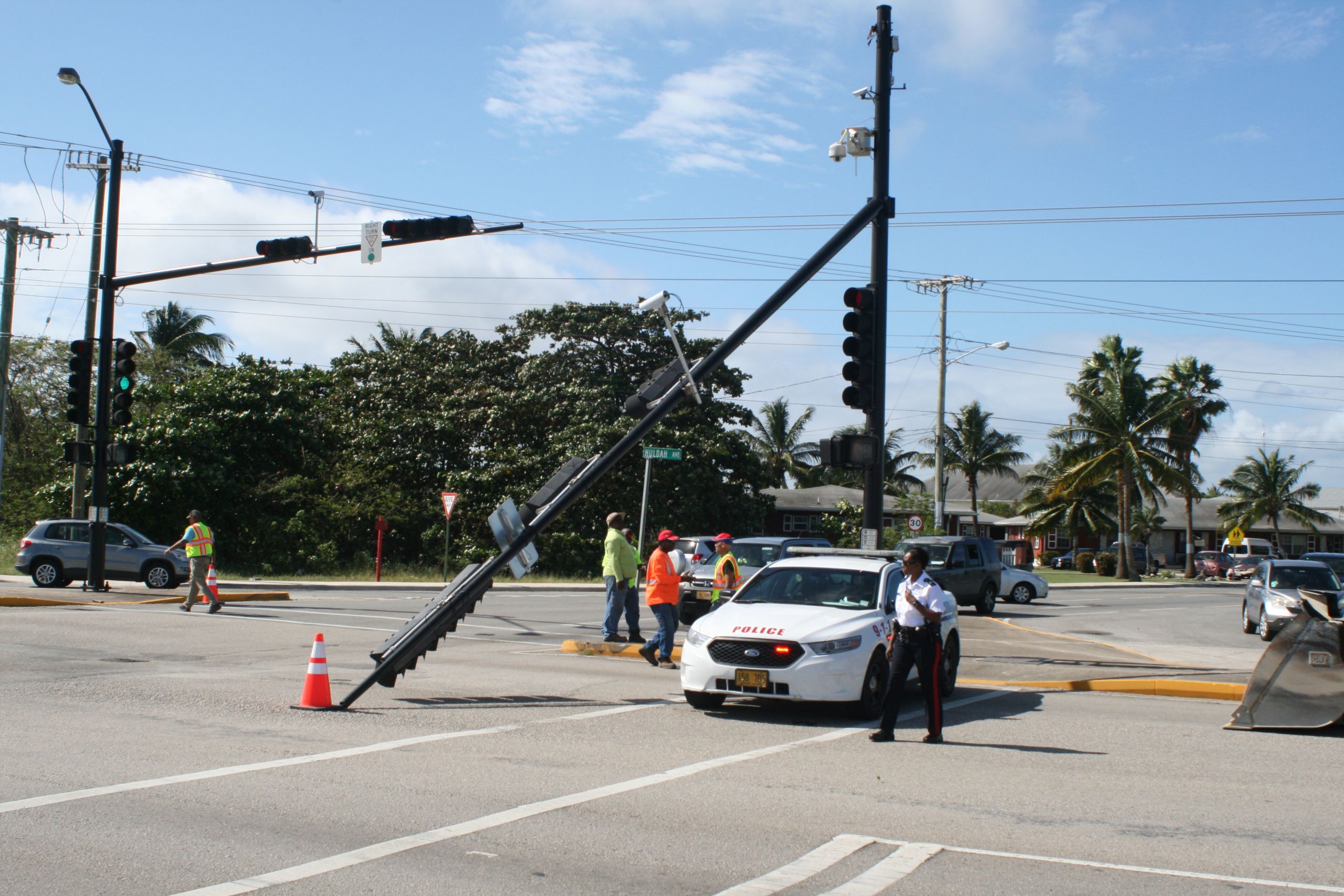 Light pole falls on road | Cayman Compass