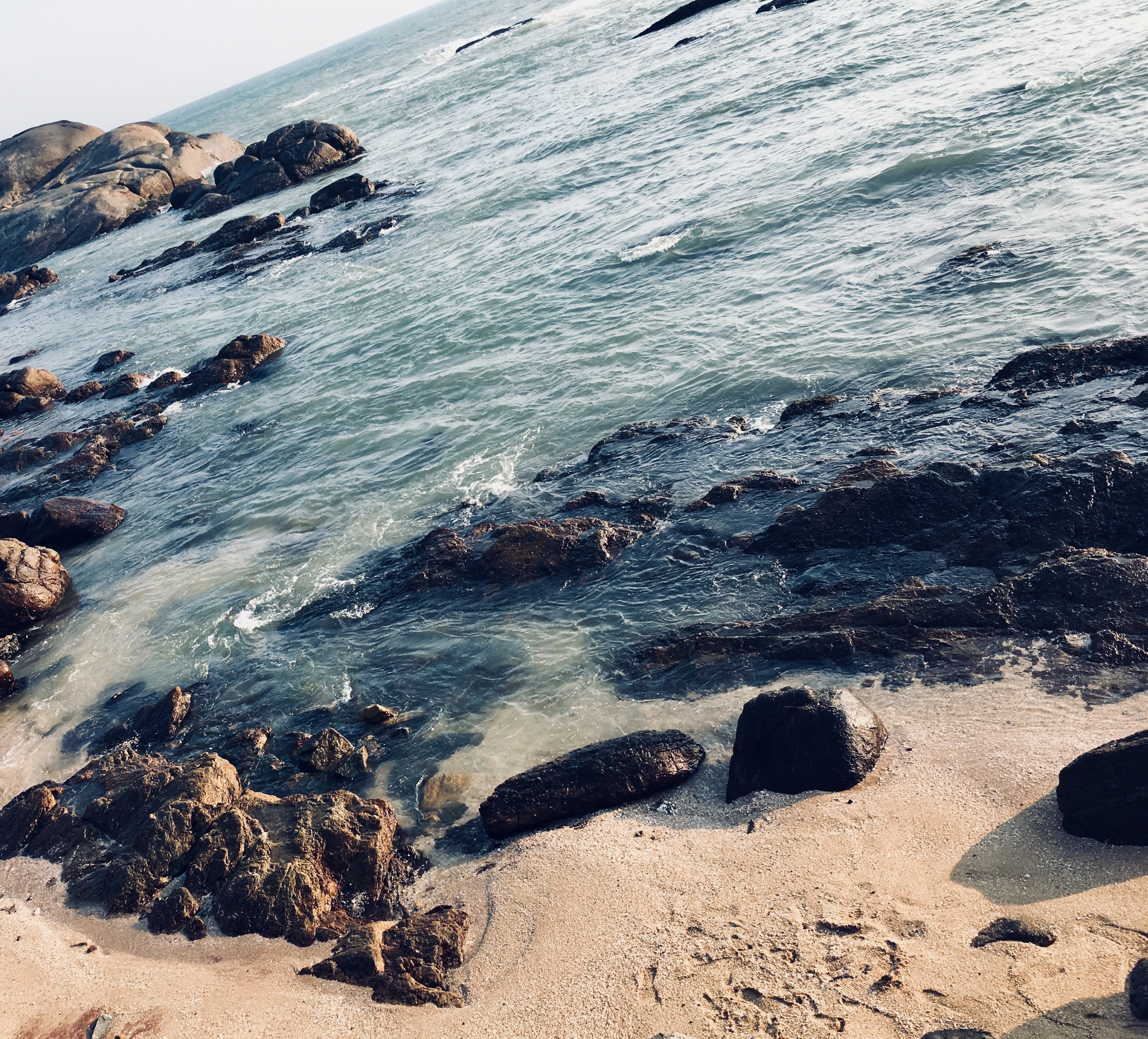Rocks on seashore photo