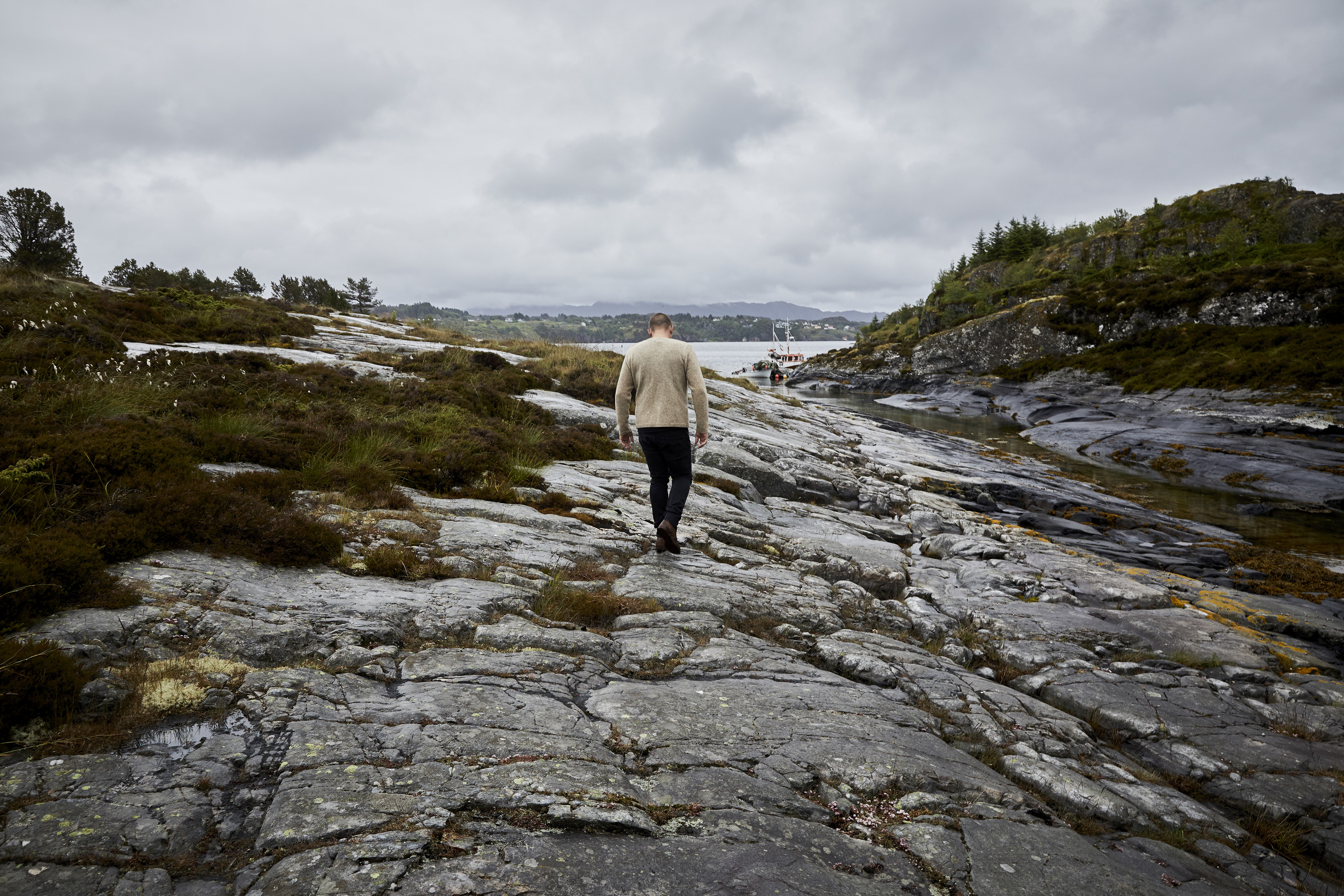 Lyseverket owner and chef Christopher Haatuft, walks across a rocky ...