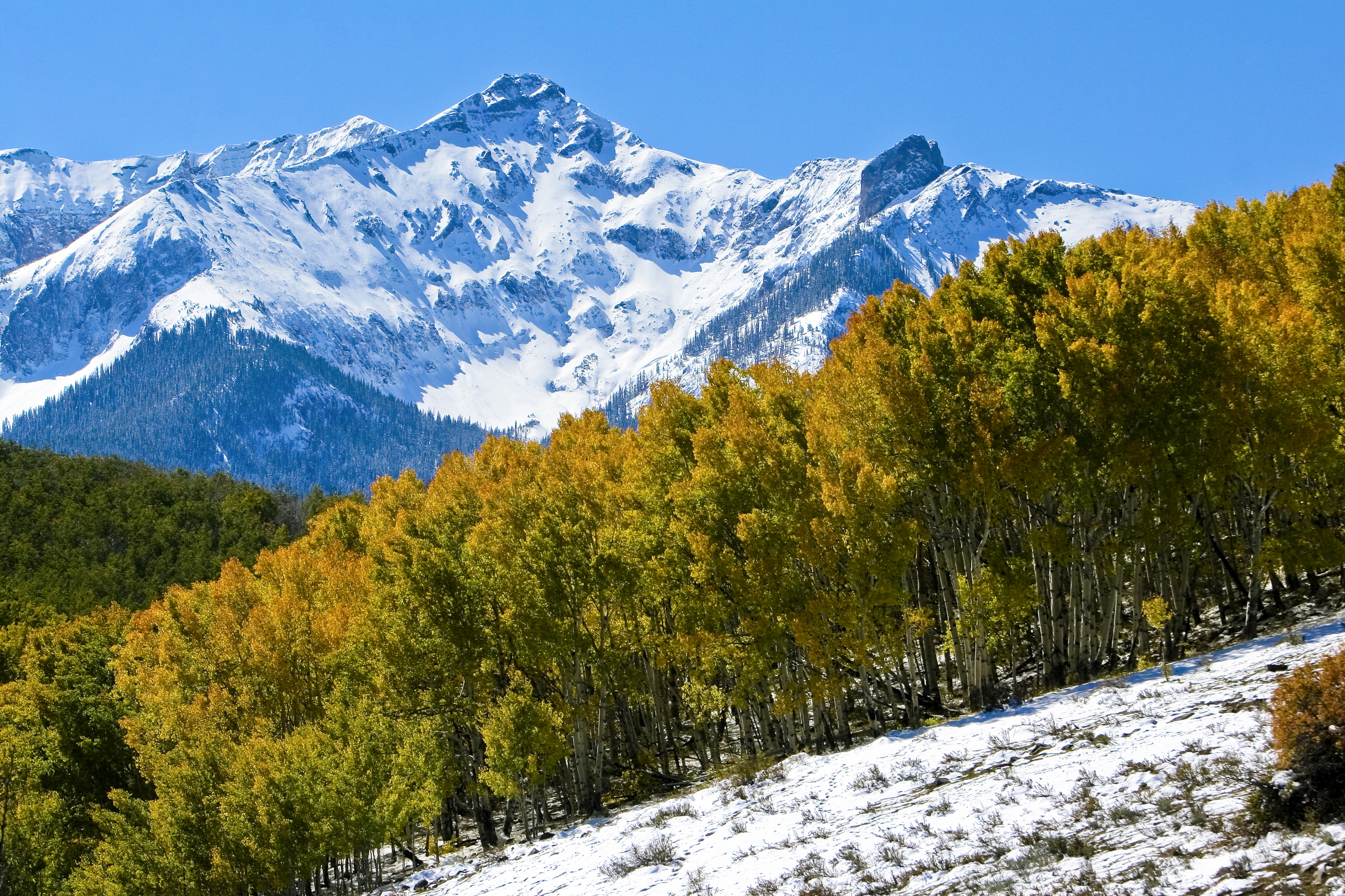 Aspens and sharp peaks are found in quintessential Rocky Mountain ...