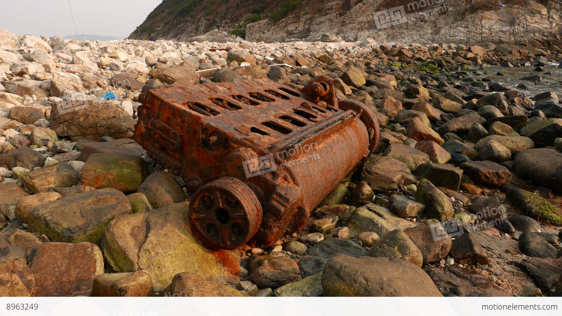 Ship Engine Rusted Skeleton On Rocky Shore, Close Up Stock video ...