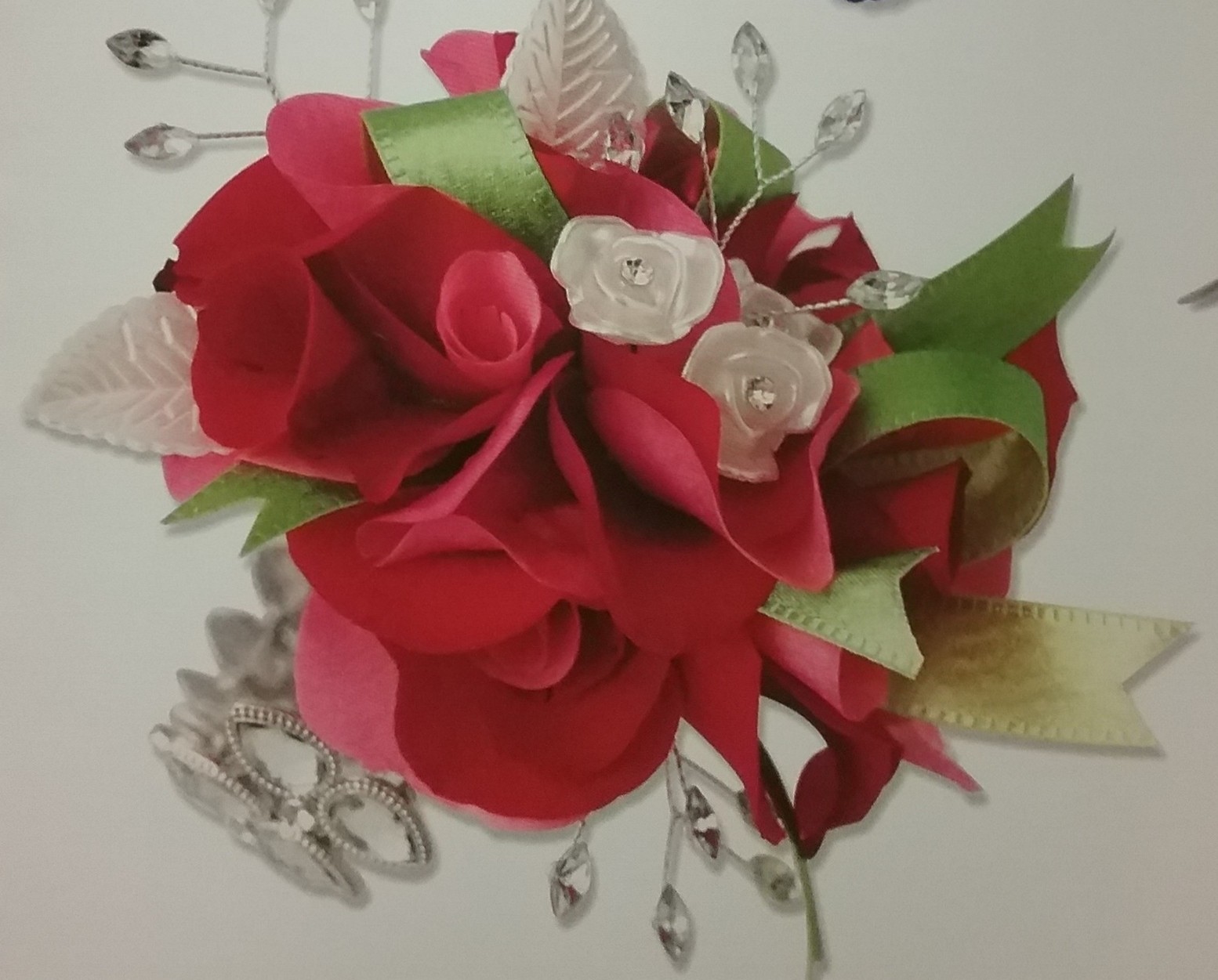PINK ROSE PETALS AND BLING WRIST CORSAGE in Wamego, KS | The Flower Mill