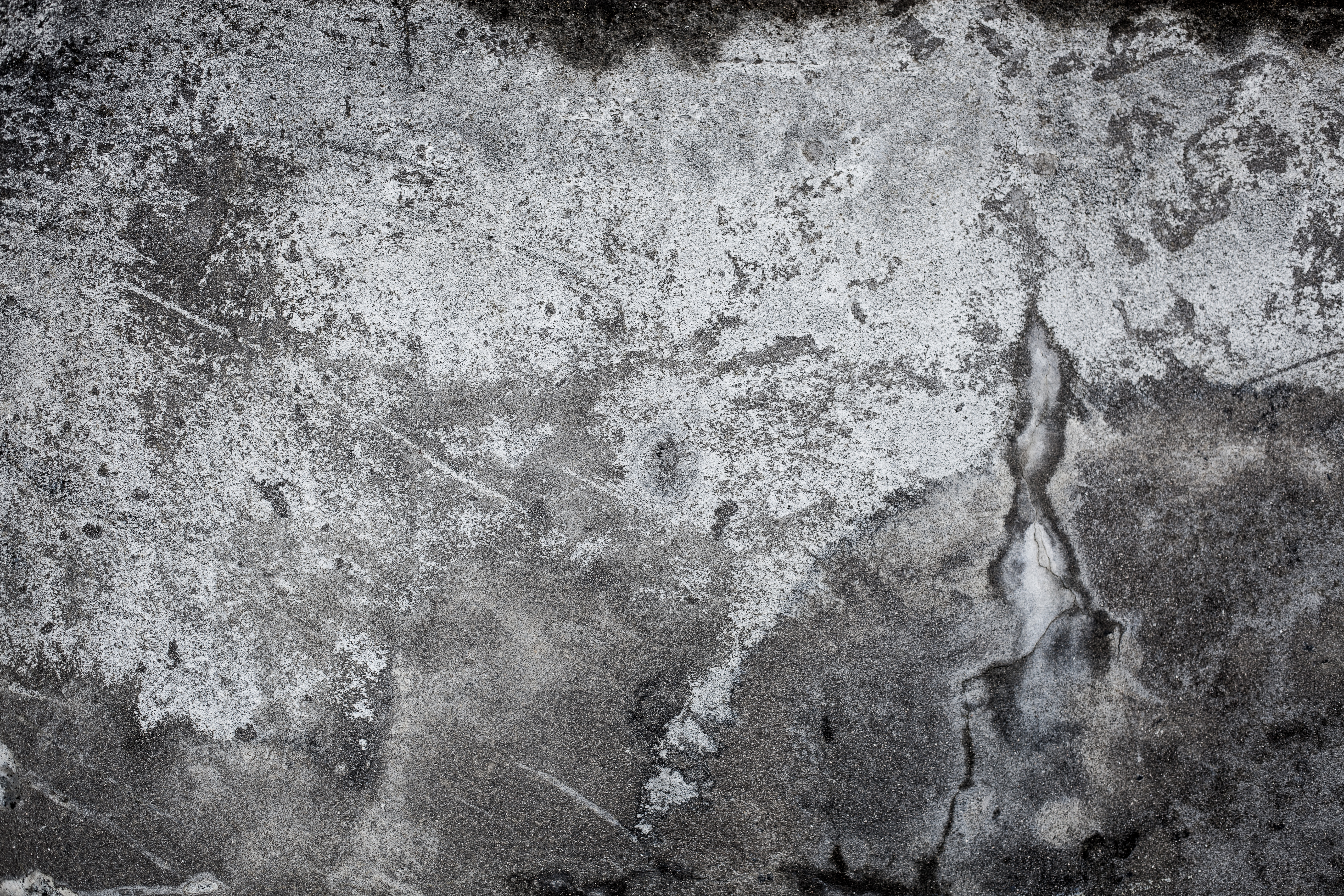 Rough cracked concrete texture photo