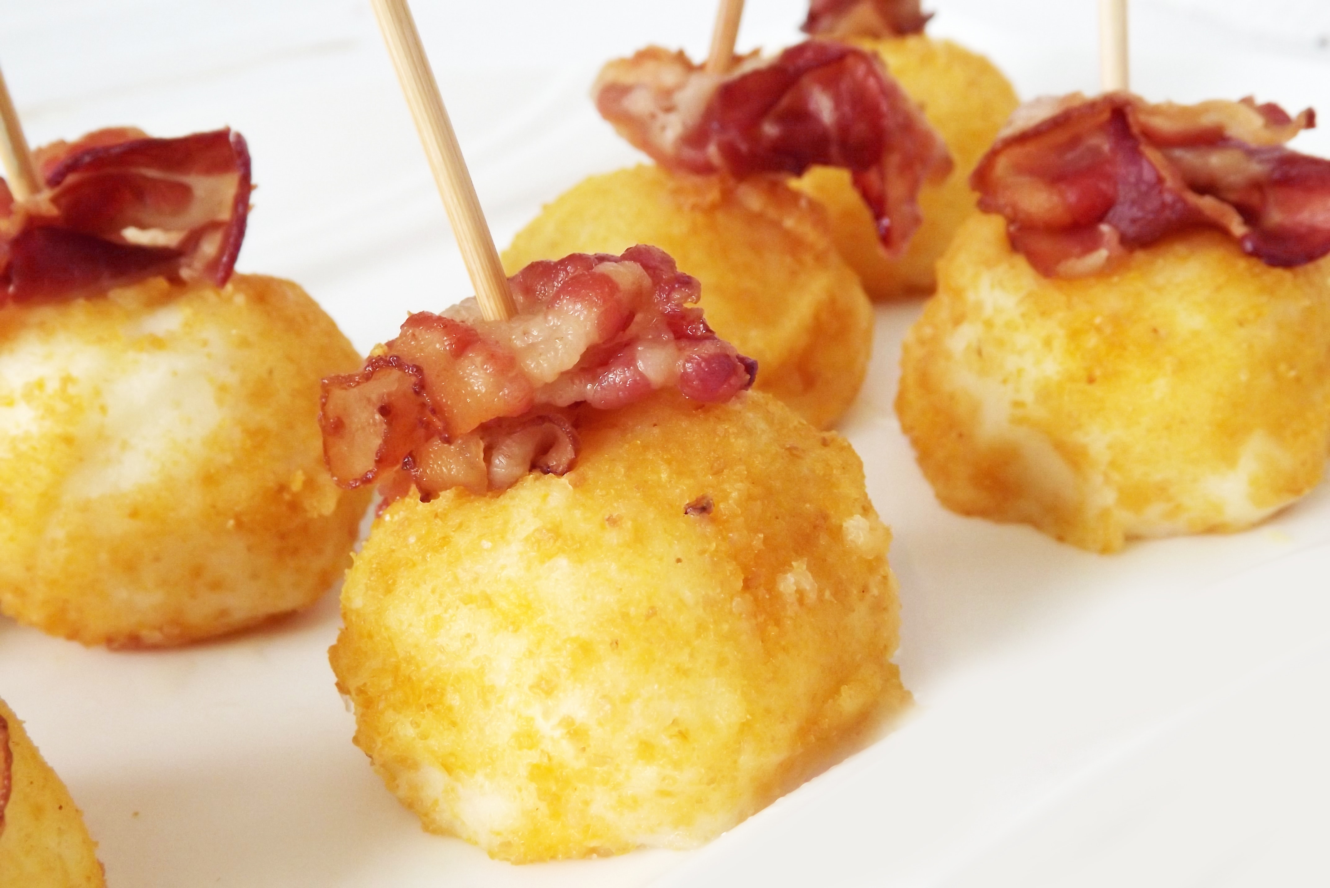 Round food with bacon photo