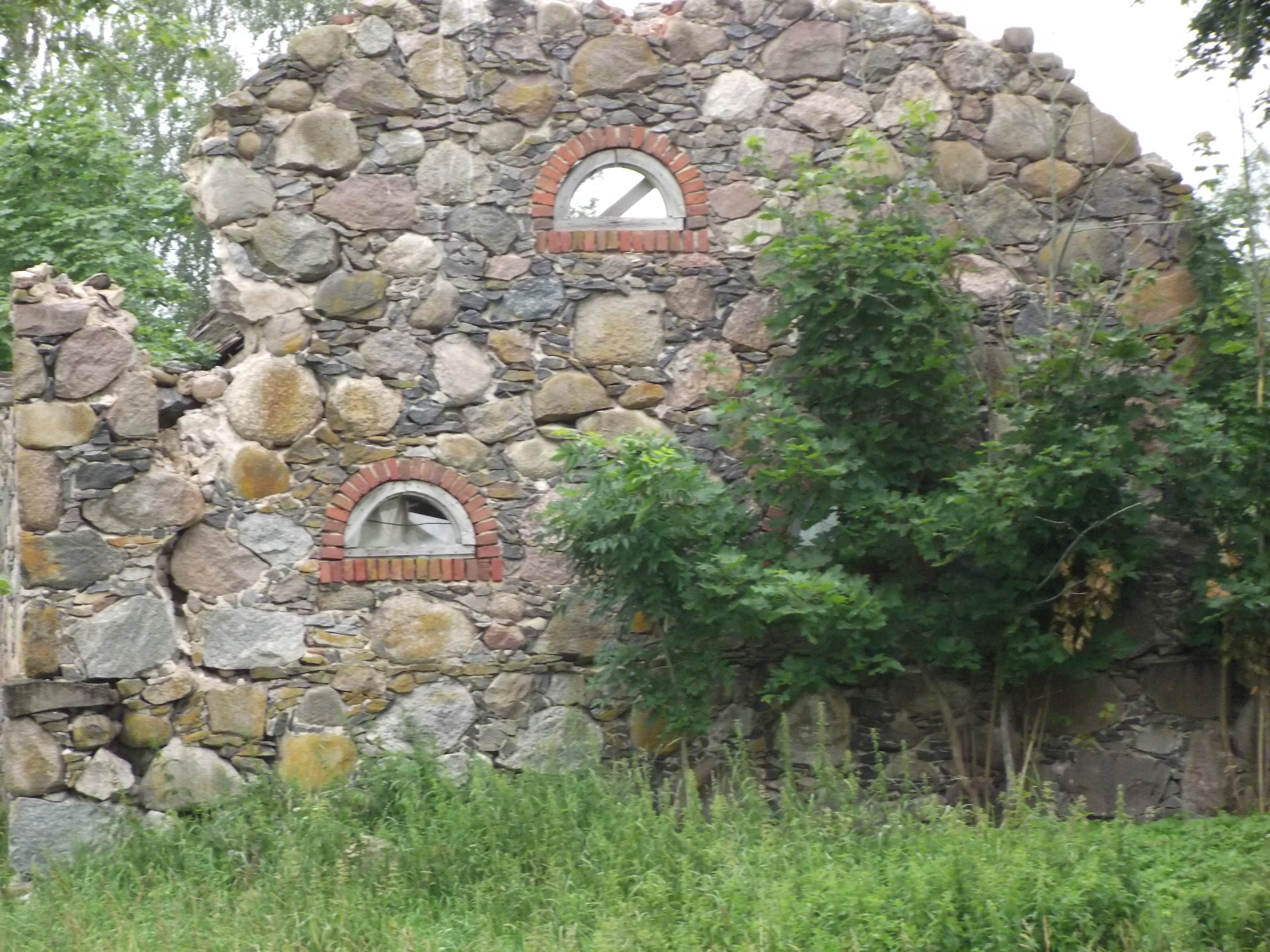 Ruins of an old stone house photo