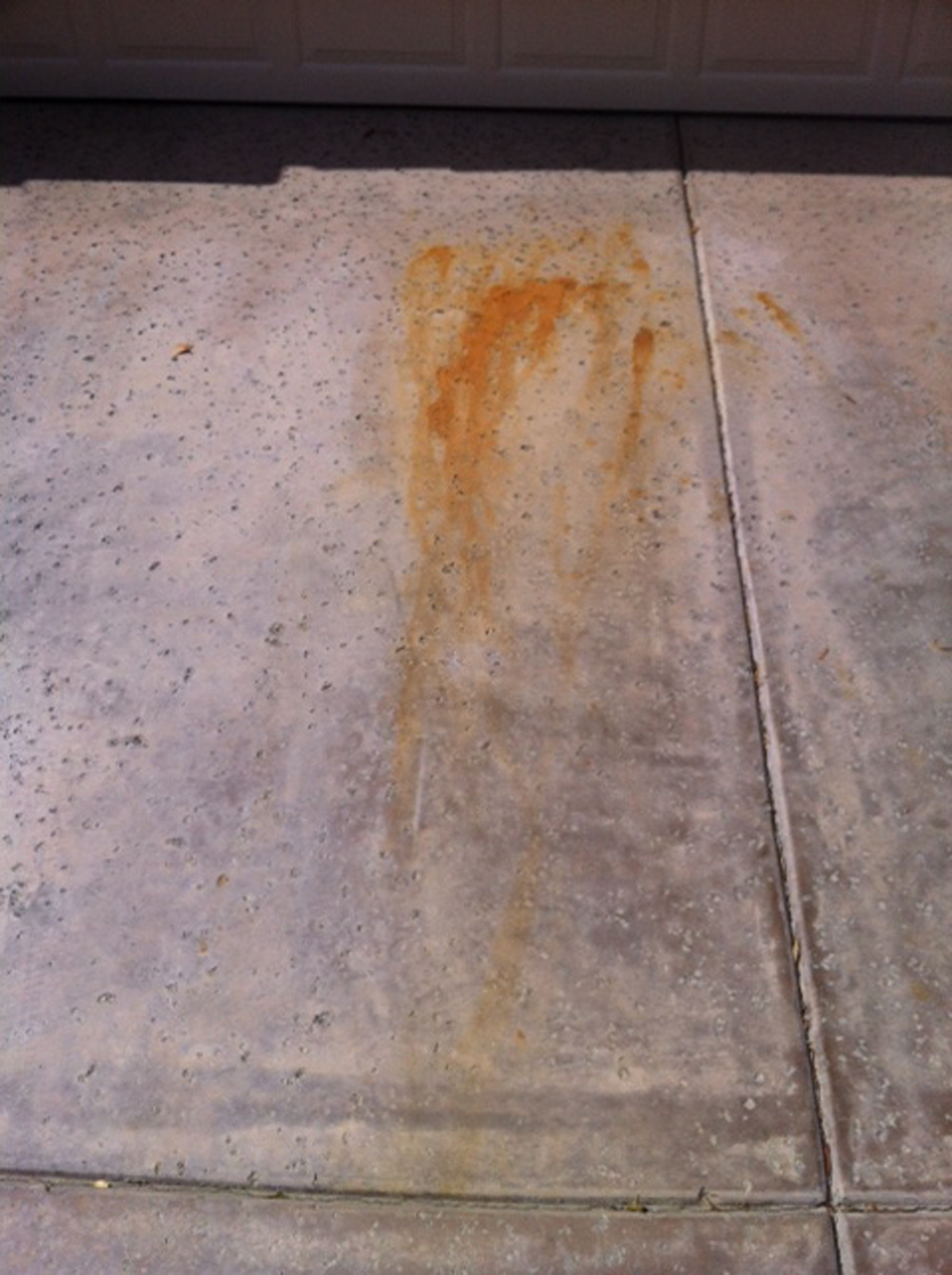 Battery Acid Stains on Colored Concrete