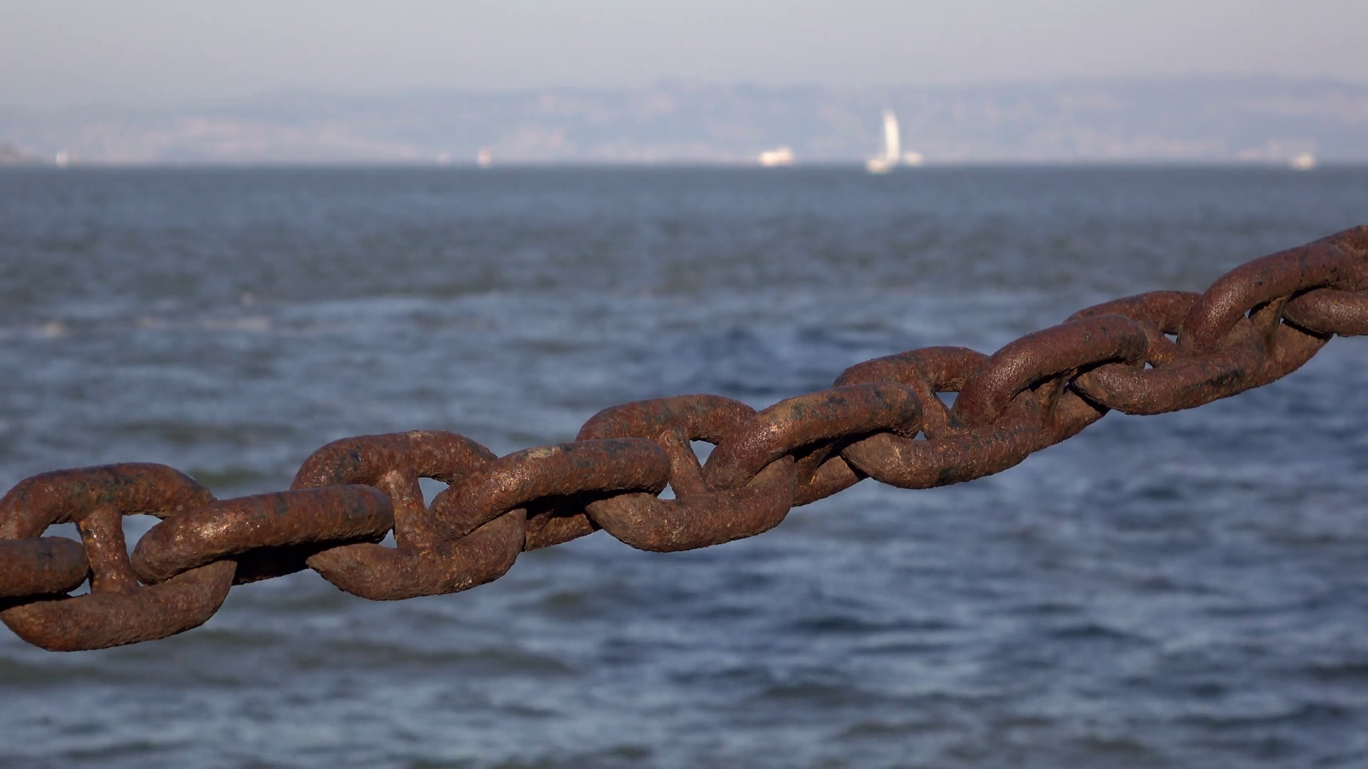 Rusted and aged heavy duty chain along ocean water 4k Stock Video ...