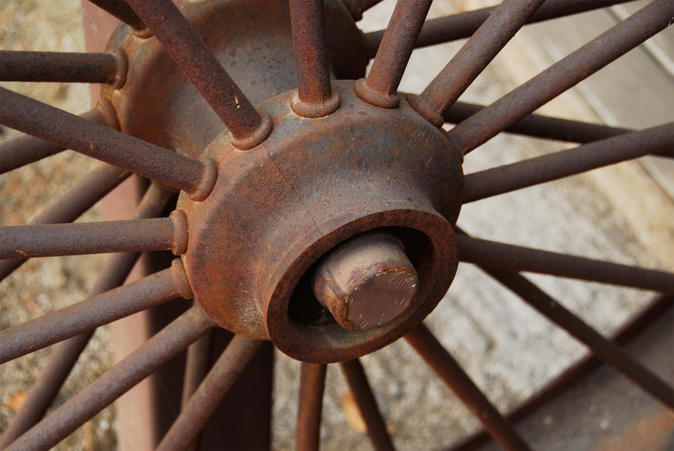 Rusted iron wagon wheel photo